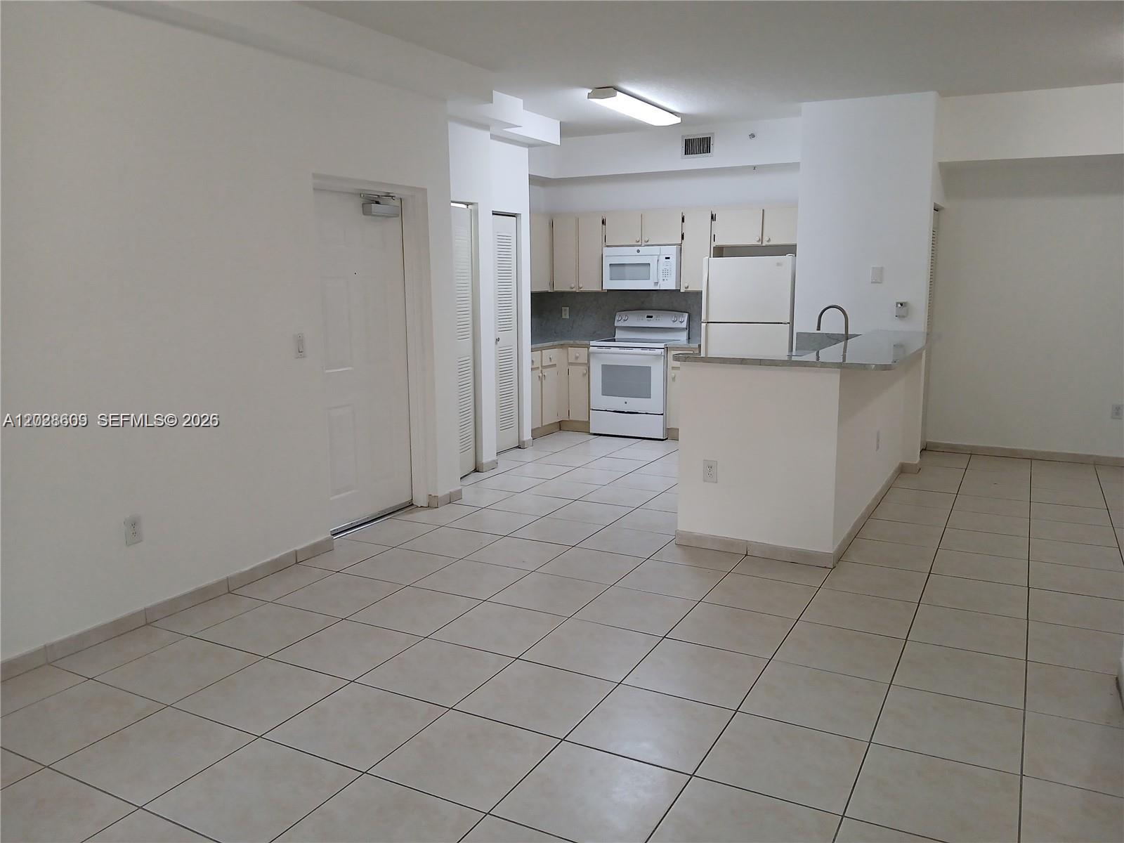 PALM GARDENS AT DORAL CON - Residential Lease
