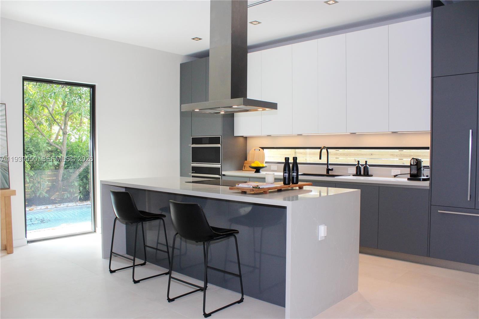 Stunning modern LEED-certified/Wellness single family residence at 3540 Oak with 4 bed 4.5 bath, offering approximately 3034 square feet of air-conditioned living space and approximately 4000 square feet of total area, thoughtfully designed for luxury & comfort. This beautifully appointed home features four spacious bedrooms, four full bathrooms plus a cabana bath, and a seamless indoor-outdoor layout ideal for entertaining. Designed with advanced building systems, the home promotes a healthier indoor environment through continuous fresh-air ventilation, enhanced air quality, balanced humidity, and low-VOC materials that help reduce indoor pollutants. Outdoor living is elevated with a private pool and summer kitchen, perfect for gatherings and everyday enjoyment. Additional features include a two-car garage, Low-E impact windows, and elegant Italian kitchen cabinetry—blending modern design with energy efficiency and upscale finishes. A perfect fusion of contemporary architecture, sustainability, and functionality, this exceptional residence reflects the wellness-driven philosophy of Ciel Grove, where forward-thinking design supports well-being, peace of mind, and a higher quality of life. Optionals: solar, battery backup, EV chargers.