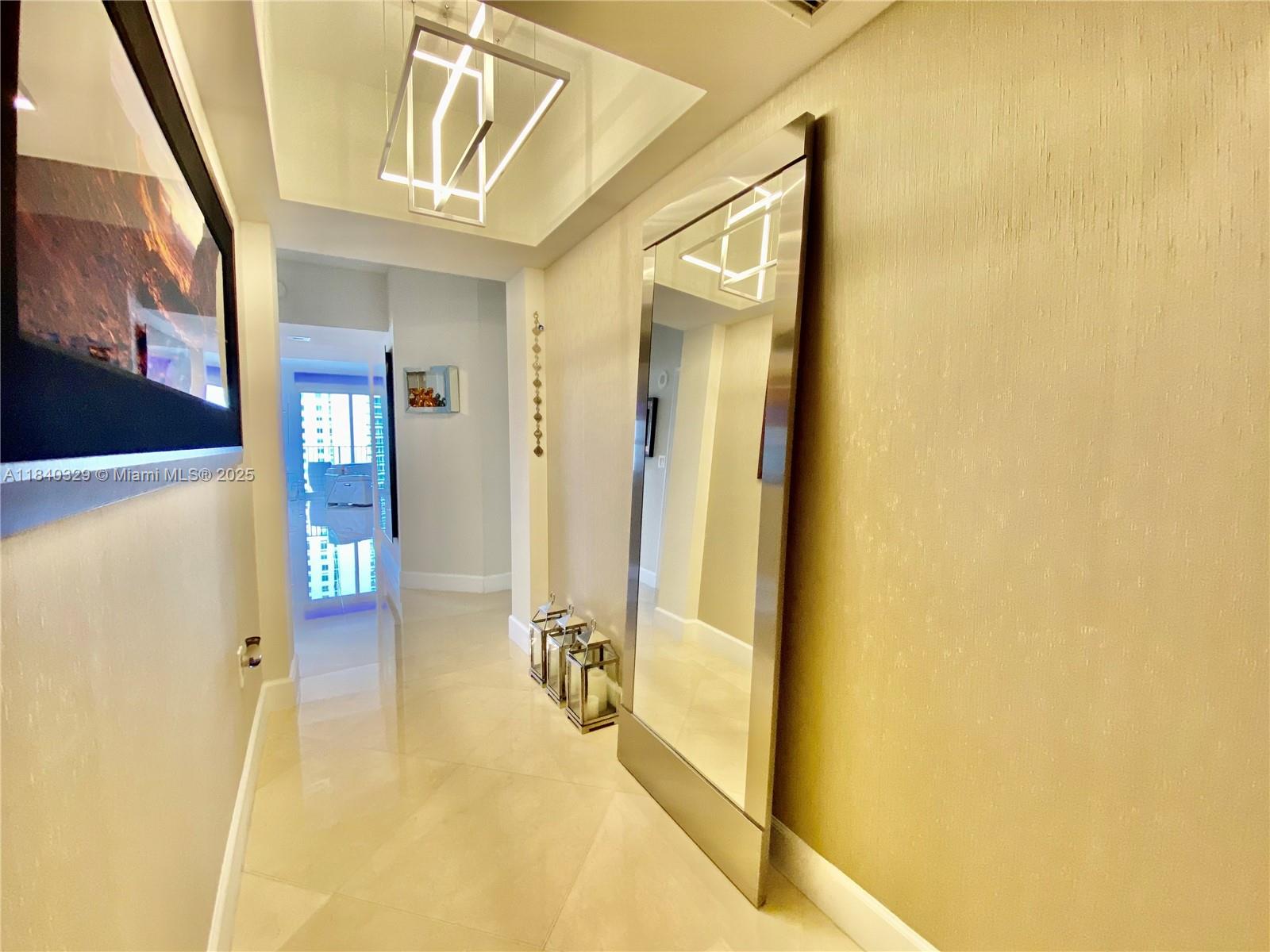 Beautifully corner unit, largest line in the 3/3 units. Done with the finest of tastes, with Italian marble floors
throughout, Italian kitchen w/ wood cabinets w/ granite countertops & stainless steel appliances. State of the arts
led fixtures, custom Closets, blackout windows on the 3 rooms, hurricane impact windows. Unit comes with 2
parking spaces assigned and storage. Turnberry village offers a full range of amenities including state of the art
fitness center, spa, resort style pool, 24/7 secured lobby and Valet, party room, billiards room. Steps to Aventura
Mall and less than a 5 minute trip to the beach! A must see.
Electric shades  ( Somfy Sistem from France )
