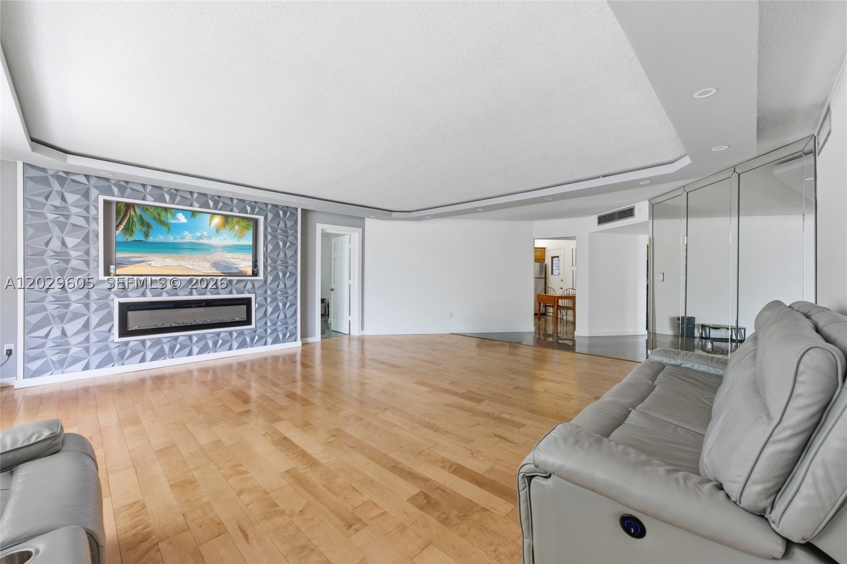 A Hidden Gem In The Heart Of Miami! Beautiful 2-Bed/2-Bath Condo In The Well-Established Rolling Green Condo Community. Spacious And Luminous Living Area Featuring A Decorative Fireplace, A Stylish Accent Wall, A Drop-Down Ceiling Detail, Rich Wood Flooring, And An Abundance Of Natural Light That Makes Every Corner Of This Home Feel Open & Inviting. Kitchen Offers A Functional & Comfortable Layout, Ready For Your Personal Touch. The Primary Bedroom Boasts Its Panoramic Views Of The Lush Garden Surroundings & A Large Window That Floods The Space W/ Natural Light Throughout The Day. Primary Bathroom Features A Walk-In Shower With Floor-To-Ceiling Tile Work & A Large White Vanity W/ Granite Countertop. Generously Sized Second Bedroom Enjoys Peaceful Views Of The Pool Area Perfect For Guests Or A Home Office. Hall Bathroom Has A Wooden Vanity, A Sleek Black Countertop, & A Shower/Tub Combination W/ An Enclosure. Residents Enjoy An Impressive Array Of Community Amenities Including Pool, Gym, Sauna, And The Added Convenience Of A Dedicated Storage Unit On Every Floor. HOA Fee Includes Water & Pest Control. 25% Min. Down Payment Required. AC 2014. Ideally Located In North Miami Just Minutes From Mall, Shops, Sunny Isles Beach, & Biscayne Boulevard. With Easy Access To I-95 & The Palmetto Expressway, Commuting To Downtown Miami, Fort Lauderdale, & Miami Beach Has Never Been More Convenient. Schedule Your Showing Today!