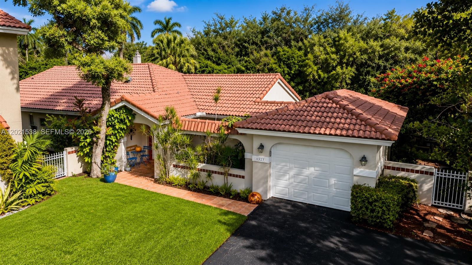 WOW! Tucked away on a premium corner lot in the boutique community of Country Isles Garden Homes, this stunningly renovated 3-bedroom, 2-bath one-story villa is truly a rare gem! From the moment you enter, you’ll love the soaring volume ceilings, abundant natural light, neutral designer paint tones, and spacious split-bedroom floor plan. The upgraded modern white kitchen offers a fresh contemporary feel and opens beautifully to the main living areas, making it ideal for both entertaining and everyday living.
The oversized primary suite is a true retreat featuring a large sitting area, generous closet space, and a beautifully renovated spa-inspired bathroom. Two additional spacious bedrooms share an updated guest bath, offering comfort and flexibility for family or guests. Step outside to the screened-in lanai overlooking the huge fenced corner yard complete with an outdoor patio, cozy fire pit area, and endless room to create your dream backyard oasis!
This home has been impeccably maintained and is move-in ready for its new owners. Enjoy a short walk to the community pool, Peace Mound Park, and Country Isles Elementary School. Zoned for Weston’s top-rated "A" schools and just a quick stroll to Weston Town Center for dining, shopping, and entertainment. South Florida living at its finest!