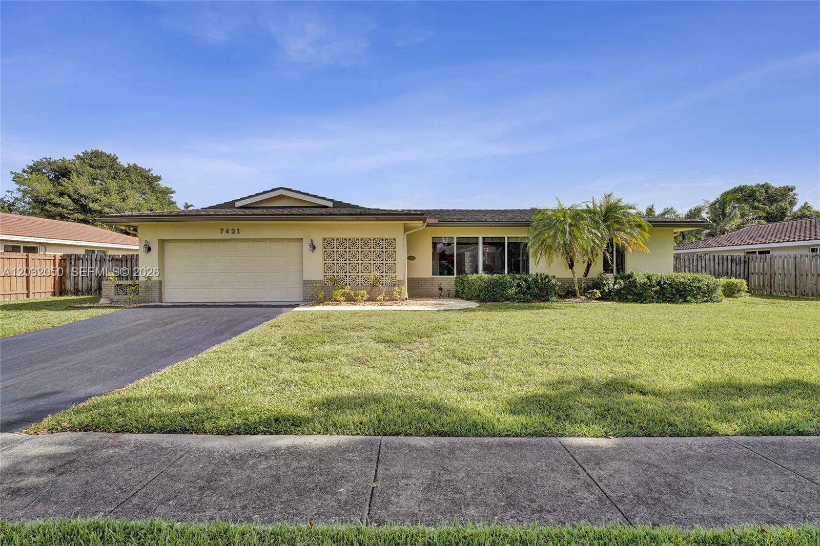 Welcome home to this well-maintained 4-bedroom, 2-bath pool home in the heart of Plantation with NO HOA. Featuring a desirable split-bedroom floor plan, this home offers comfortable living spaces and a layout designed for both everyday living and entertaining. Laminate flooring runs throughout the main living areas, while the cabana bath provides convenient access to the pool and patio. Enjoy South Florida living year-round in your private backyard retreat complete with a sparkling pool, covered patio, and expansive fenced yard with plenty of room for outdoor activities, pets, or future enhancements. Additional updates include a **metal roof and impact windows** throughout most of the home, providing peace of mind and added storm protection. Conveniently located near parks, shopping, dining, and major roadways, this property offers the space, flexibility, and features today's buyers are looking for—all without the restrictions or fees of an HOA.