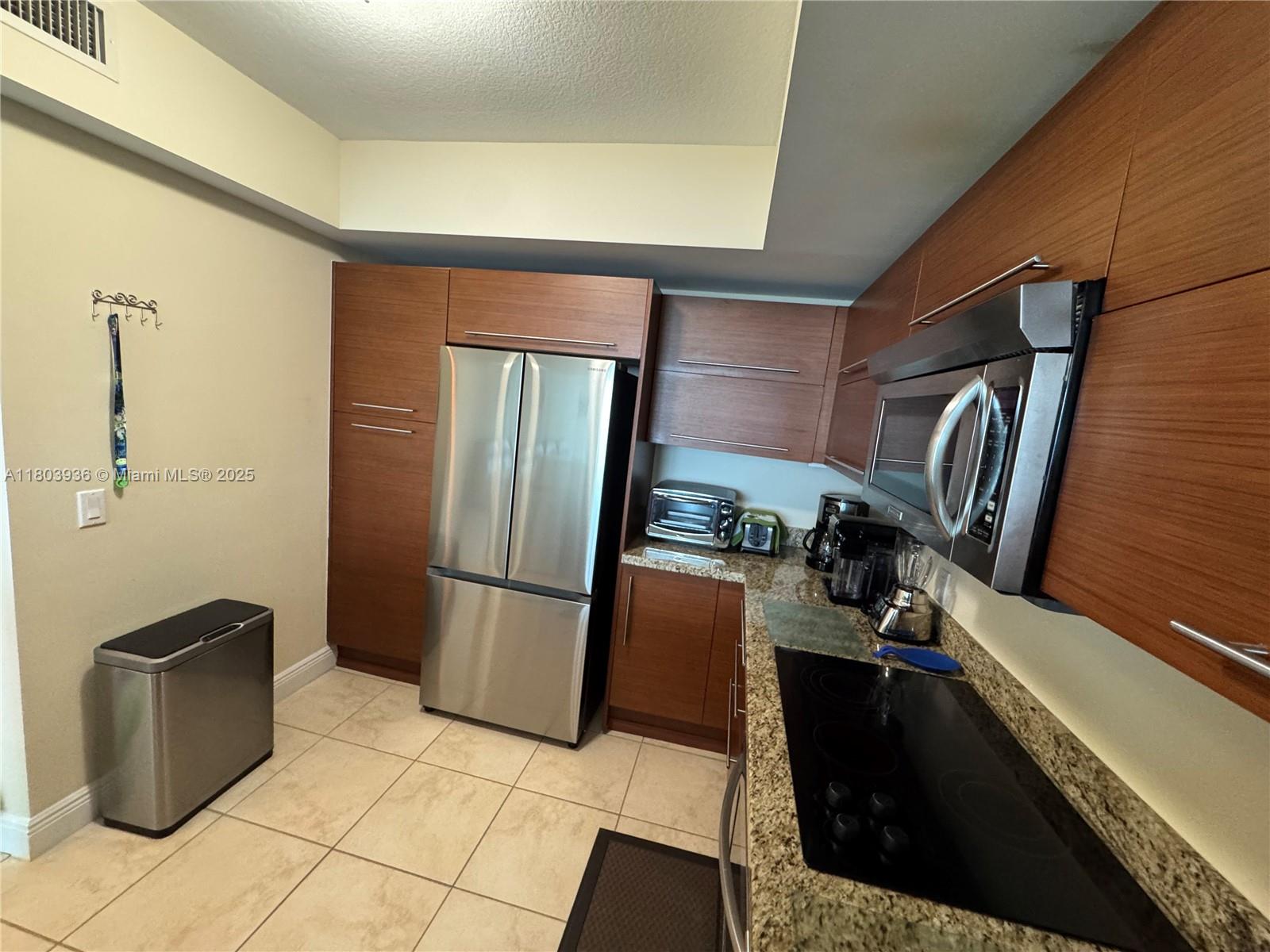 TAO SAWGRASS CONDOMINIUM - Residential