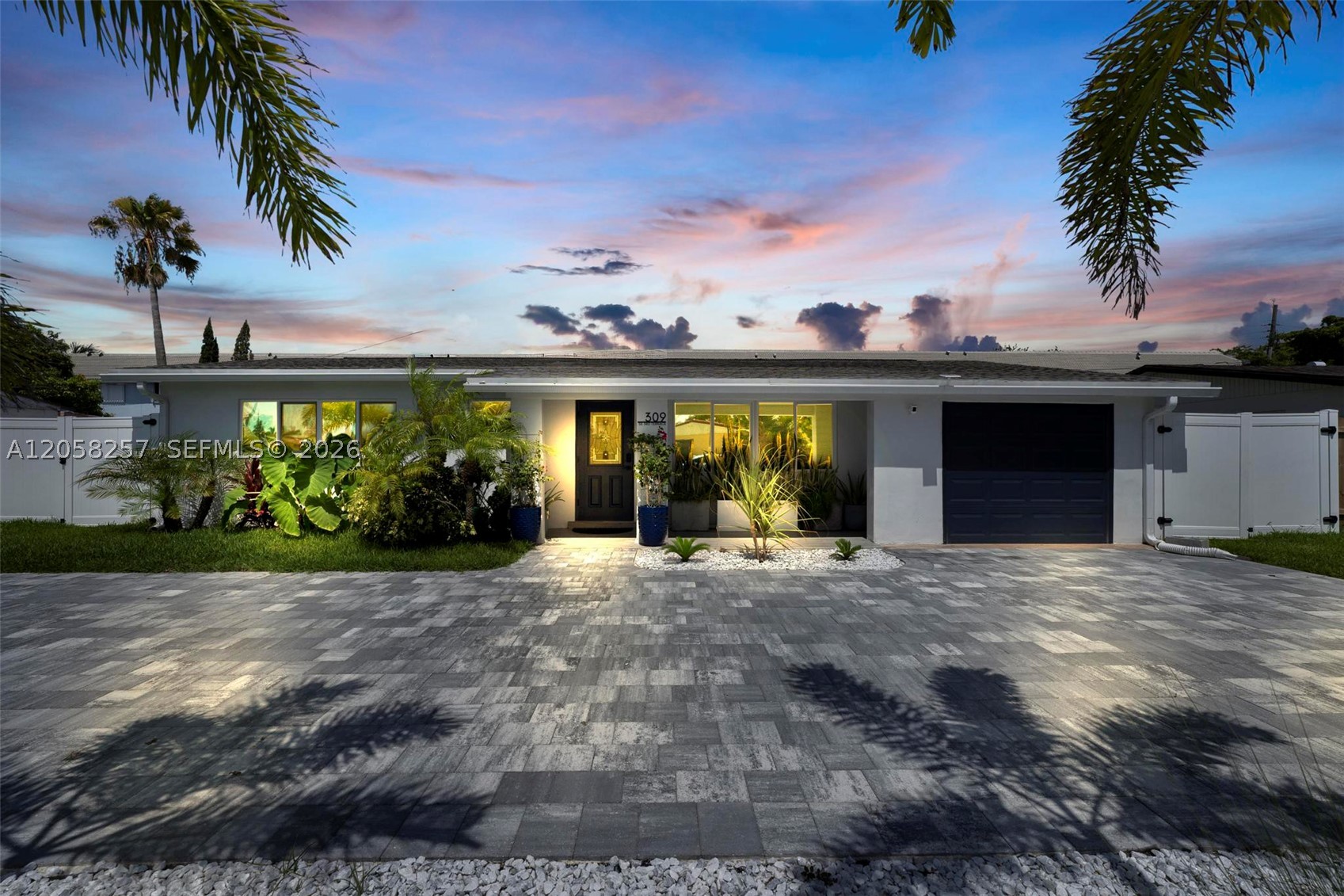 Located in the desirable and quiet Coral Manors neighborhood, this 4 bedroom 2 bath 1684 sf home presents a solid investment opportunity with immediate income in place. No HOA and Airbnb Friendly! Currently tenant occupied month to month at $4,000 per month. The home features impact windows throughout, a 2021 roof, and a newly installed Carrier A/C unit. 6-foot privacy fence enclosing a spacious backyard with room to add a pool. Garage has been converted legally to living space. The oversized 1,300 sf driveway accommodates up to six vehicles.  Equipped with a Ring alarm system for added security.  Please do not disturb tenants. Showings will be granted only with a fully executed contract. View matterport for a detailed walkthrough of the property.