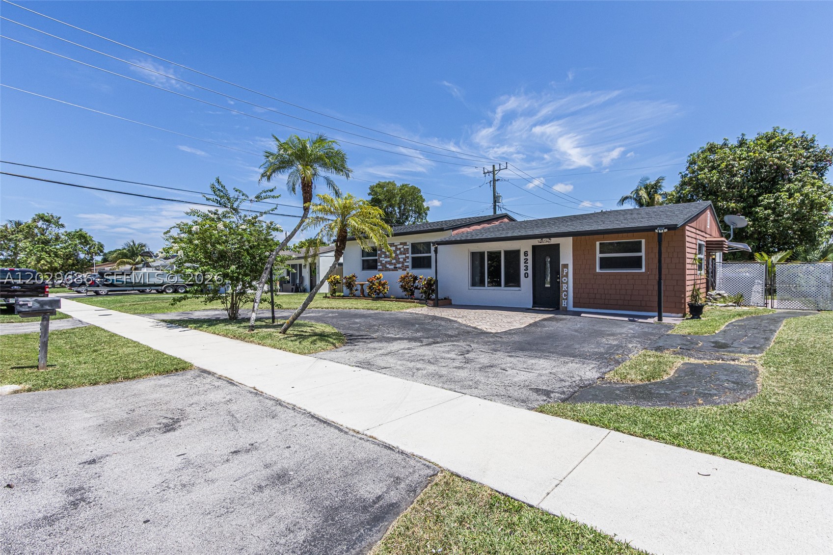 Welcome to this thoughtfully updated 4-bedroom, 2-bath home in North Lauderdale, offering a flexible layout and plenty of room to make it your own. Updated flooring and a remodeled kitchen provide a fresh, inviting feel, while newer windows and a 2023 roof offer added peace of mind.  Inside, the versatile floor plan provides space for guests, working from home, hobbies, or everyday living. Natural light fills the living areas, creating a warm and comfortable atmosphere throughout.  Step outside and discover a spacious backyard with room to spread out, entertain, or cultivate your dream garden. Gardening enthusiasts will appreciate the mature fruit plants already established, creating a peaceful setting and providing fresh seasonal harvests right at home. A large detached workshop offers incredible space for storage, projects, hobbies, or creative pursuits.  Conveniently located near parks, schools, shopping, dining, and major roadways, this home combines comfort, functionality, and outdoor potential. Whether you're looking for room to grow, a place to enjoy your favorite hobbies, or simply a home with flexibility and charm, this property is ready to welcome its next owners.
