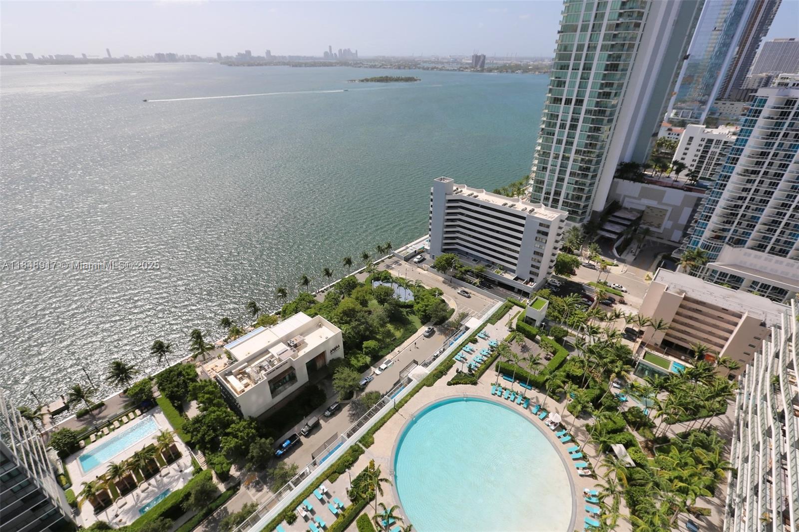 Stunning 2BR/3BA luxury rental on the 26th flr of Paraiso Bay w/ unobstructed bay views to South Beach & beyond. Private elevator foyer, custom lighting, sheers, & deep balcony ideal for indoor-outdoor living. Split floor plan, upgraded finishes, spa-like baths, open kitchen with island seating and high ceilings. In-unit washer and dryer with  custom fitted walk-in closets bring luxury to anew level. Paraiso Bay offers Miami’s best amenities: resort pool, spa, gym, theater, tennis and even a bowling alley. Prime Edgewater location near the new Whole Foods, Wynwood, Design District & Downtown. Across the street from acclaimed Amara restaurant. Pets considered. Live the luxury high-rise lifestyle in one of Miami’s most coveted towers! One assigned parking included