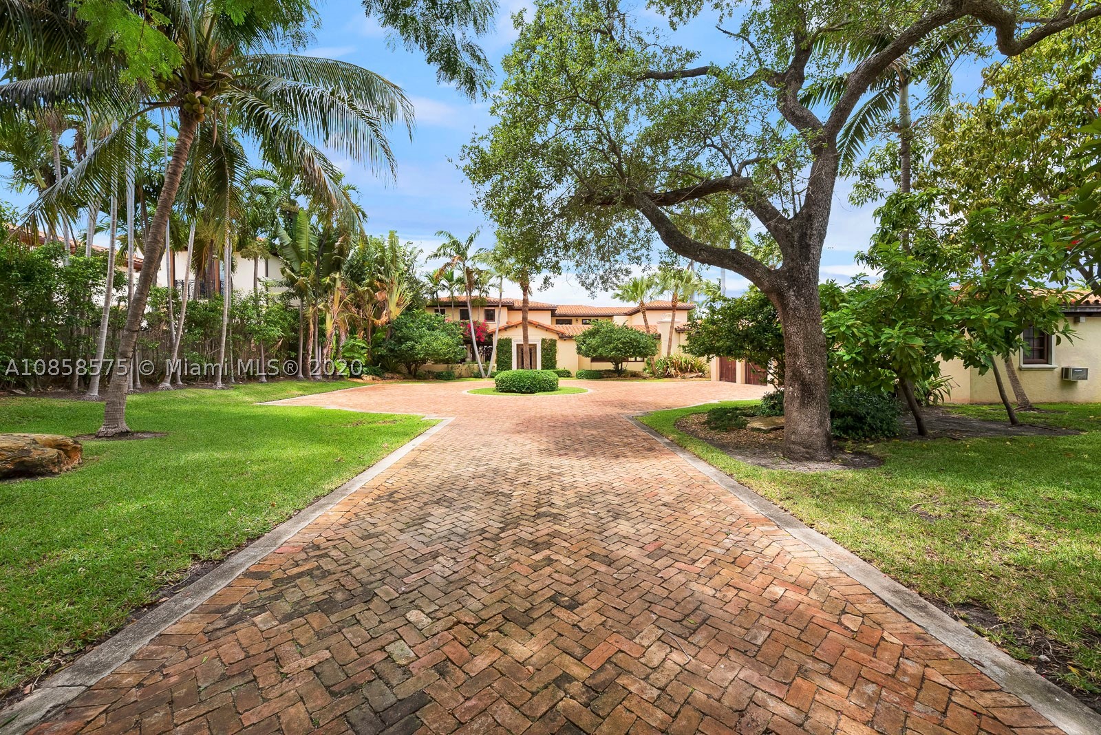 Experience the best views in Miami on this 25,215 SF lot. Incredible opportunity to live on coveted Upper North Bay Rd in this classic Pancoast waterfront estate. Offering 103 feet of sparkling waterfront on the wide bay, enjoy breathtaking bay and downtown Miami skyline views. With stunning views from every room, features include stone, marble and wood throughout, media room with a custom bar, principal suite with an oversized bathroom. The outdoors are perfect for entertaining complete with a heated pool with spa and a custom dock with boatlift. Available: Build your dream home with plans by renowned Brazilian architect, Marcio Kogan.