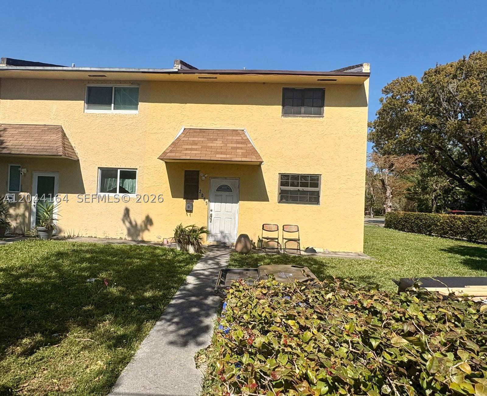 The Ultimate Investor Opportunity: Corner Unit Townhome East of Biscayne, up-and-coming pocket of North Miami Beach. This rare corner unit provides extra privacy and coveted direct yard access, offering the kind of outdoor potential you rarely find in townhome living. The two-story layout features two spacious primary suites upstairs, each with its own private bathroom, along with a convenient guest half-bath on the main level for visitors. Unlike most properties in the area, this home offers the total freedom of having absolutely no HOA, meaning you can forget about monthly dues, restrictive board approvals, or rental caps. This property serves as a complete blank canvas, The location is unbeatable for a high-yield rental, situated East of Biscayne Blvd just fifteen minutes from the sun and surf of Sunny Isles Beach. Daily errands are a breeze with major shopping centers, big-box retail, and a variety of popular fast-food favorites all within easy walking distance. This is a premier chance to secure a fee-simple corner property in a high-growth coastal corridor before prices climb further. don't miss out on this high-potential canvas!