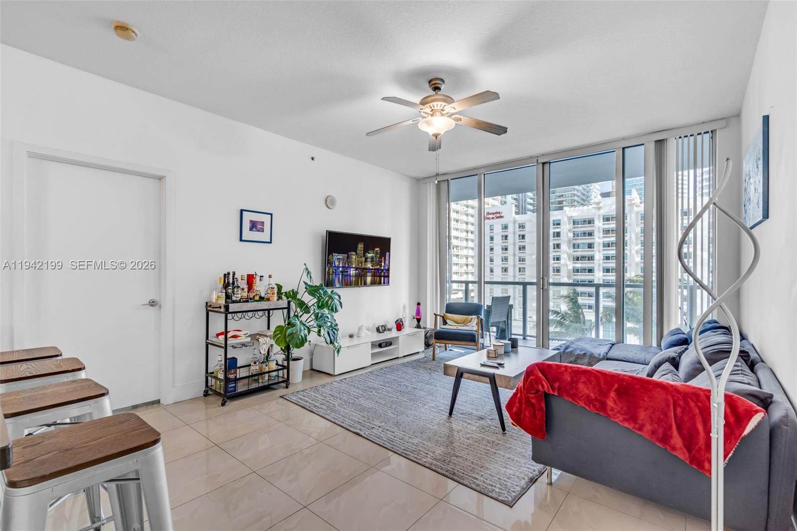 Stunning 2 Bed / 2 Bath + Den residence featuring a desirable split floor plan, ideally located in the heart of Brickell. This spacious unit offers tile flooring throughout, floor-to-ceiling glass, and wide balconies with serene garden views. The modern kitchen showcases European-style cabinetry, stainless steel appliances, and a mosaic backsplash.
The building offers resort-style amenities, including two swimming pools, private cabanas, spa, state-of-the-art fitness center, business center, movie theater, and 24-hour security and concierge services.
One assigned parking space included.