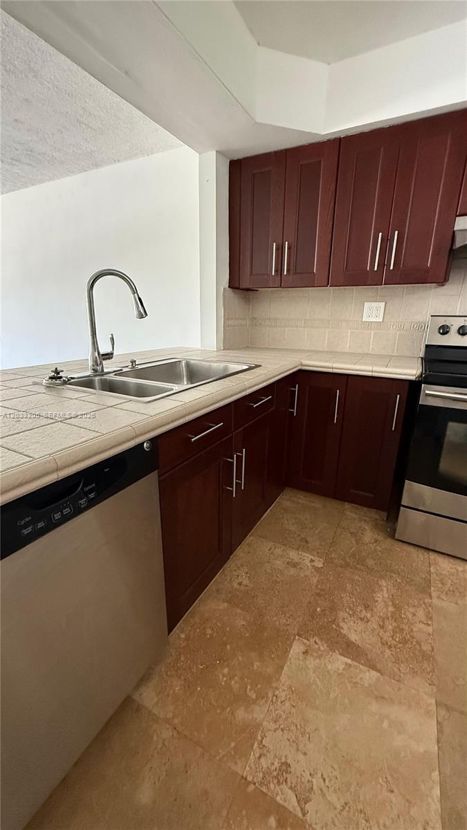 Beautiful and spacious 1-bedroom, 1.5-bath condo featuring a well-maintained and updated kitchen, renovated bathrooms, and tile flooring throughout. Enjoy a private balcony, perfect for relaxing and enjoying the outdoors. Ideally located close to shopping centers, supermarkets, dining, and everyday conveniences, with Aventura just minutes away. This inviting residence offers comfort, convenience, and an excellent location. Association approval is required and may take up to 30 days. Renting permitted after one year of ownership