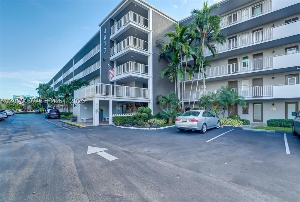ASSESSMENTS PAID IN FULL BY SELLER! FURNISHED 2 BED / 2 BATH CONDO located in the 55+ building of HILLCREST COUNTRY CLUB. This condo is located on the TOP floor, therefore no additional upstair neighbors. Kitchen is equipped with a dishwasher and has a little sitting area. Big living area that leads to the immense balcony that is also connected to the primary bedroom. Balcony is screened in. Primary bedroom has a nice walk-in closet and its own bathroom. Building does have an elevator and plenty of guest parking spots. Great ameneties that are walking distance such as gym, exercise room, etc