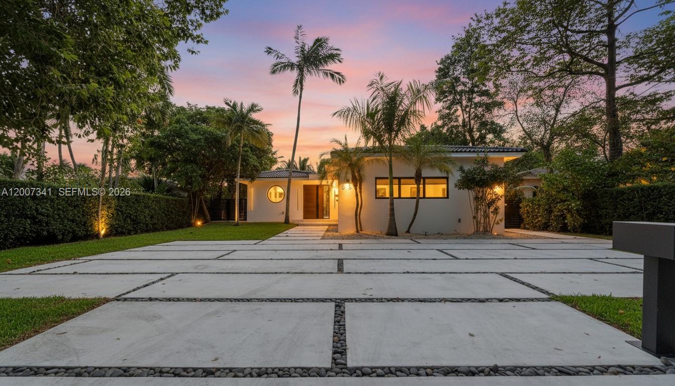 Completely redesigned modern waterfront home in the exclusive Normandy Shores community of Miami Beach. This 4 bed, 4.5 bath residence spans 3,386 sq.ft. under A/C of bright open living space with floor-to-ceiling glass, designer kitchen, and refined finishes throughout. Expansive backyard with pool, tropical landscaping, and a 70 ft boat dock offering direct ocean access. A perfect blend of contemporary architecture and serene waterfront living, ready for immediate enjoyment. The property is vacant and ready to show — schedule your visit anytime. Please be sure to watch the video walkthrough tour.