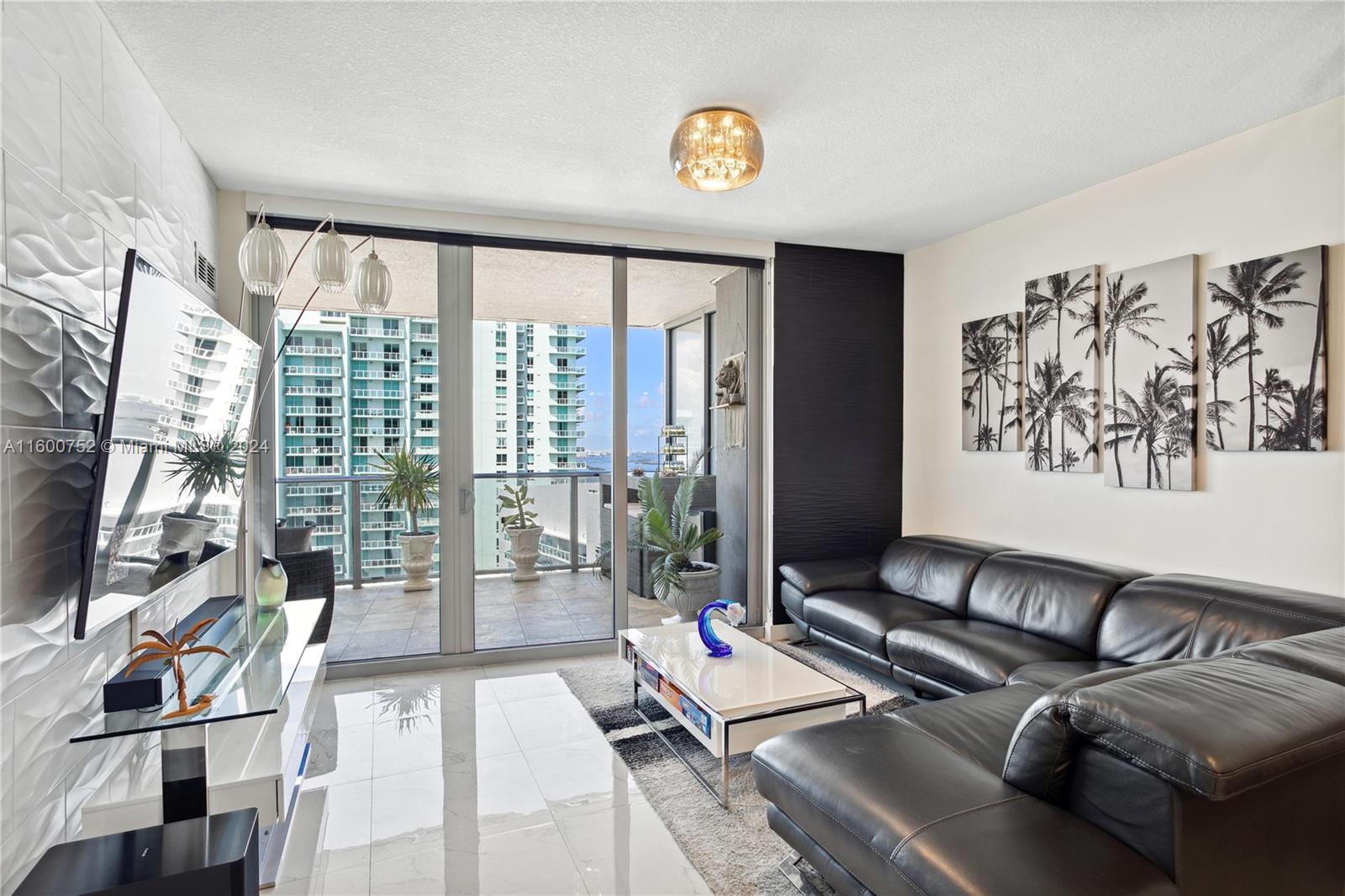 Oversized 2 bedrooms (Large Den Converted to 2nd Bedroom) 2 full baths, large terrace with ocean and city views. Porcelain floors throughout, Italian cabinets and quartz tops in kitchen and bathrooms. Stainless steel appliances, built in closets & window treatments. One assigned parking space, cable & internet included. UNIT COMES FULLY FURNISHED.