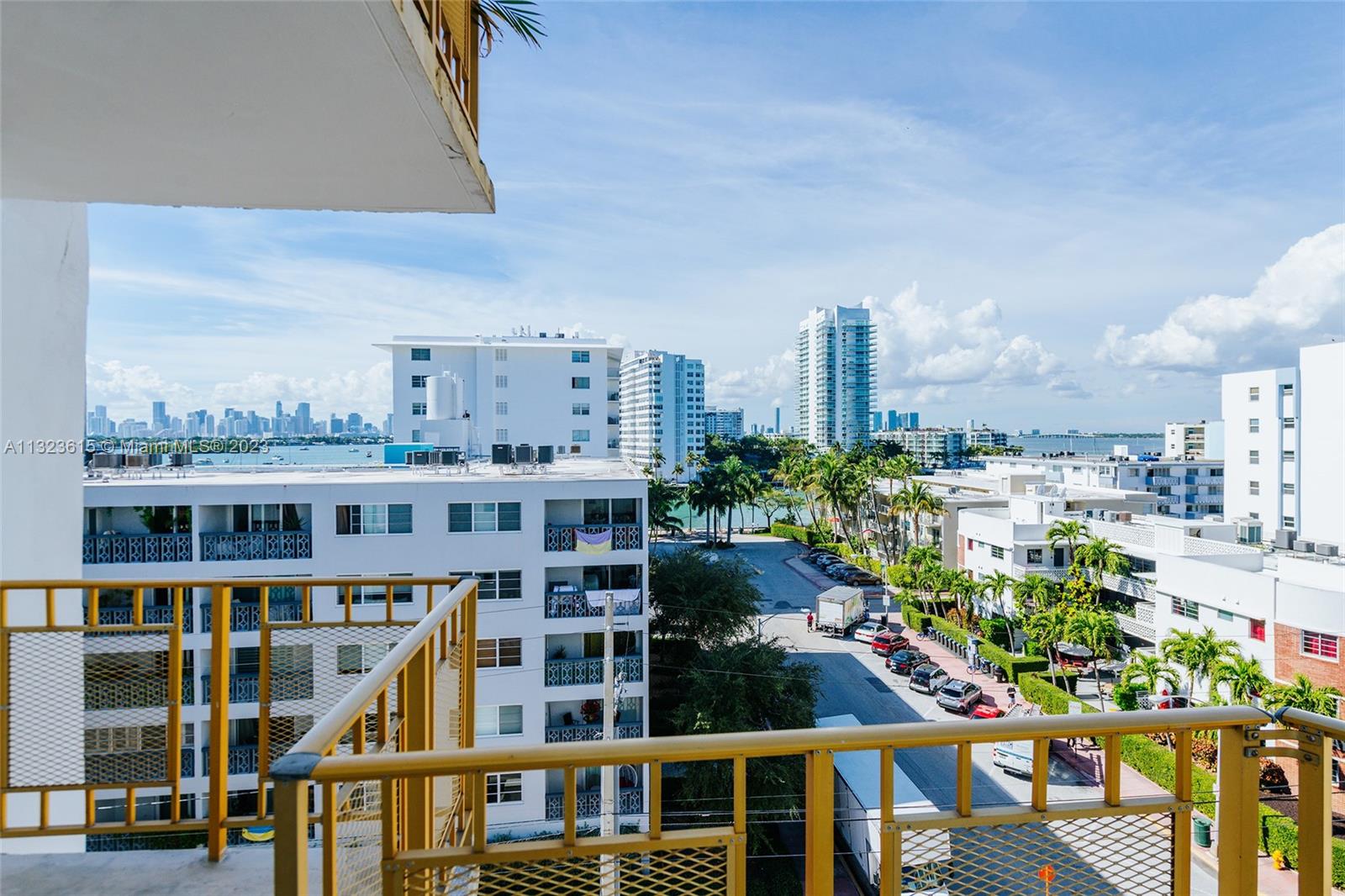 Perfect South Beach location for this 847 sq ft 1 bedroom corner unit with priceless views. Open kitchen to living/dining area.  Spectacular bay views and sunsets from living room and bedroom terrace. Extra converted space perfect for a home office.  Secured building with gated, covered parking spot and pool. Steps from Lincoln Road Shopping; Trader Joe’s; and Sunset Harbor food and beverage locations. Laundry room on each floor. Bright and sunny space with great cross breezes throughout the unit.