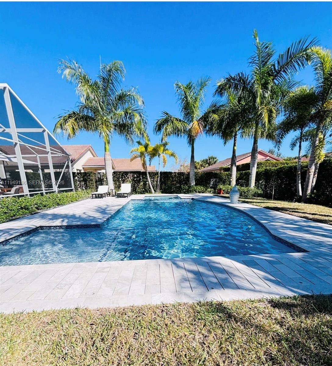 MAKE THIS LITTLE OASIS YOUR NEXT HOME. CENTRALLY LOCATED IN HERITAGE OAKS AT THE HEART OF TRADITION. THIS METICULOUS 3 BEDROOM 2 BATH HAS A UNIQUE CUSTOM UPGRADES FROM INSIDE-OUT, FROM BUILT-IN CUSTOM CLOSETS, CABINETS AND DRAWS IN GARAGE, BEDROOMS, KITCHEN, LIVING ROOM AND OUTDOOR KITCHEN-BBQ. THE OUTDOOR KITCHEN-BBQ AREA IS CONVENIENTLY UNDER ROOF AND SCREENED PORCH WITH EXTRA SPACE FOR RELAXING AND ENTERTAINMENT. ENJOY THIS OWN GATEWAY WITH THE BREATHTAKING SALT HEATED POOL AND JACUZZI-SPA SURROUNDED WITH A REMARKABLE GARDEN OF PALM TREES, IN A FENCED BACKYARD.