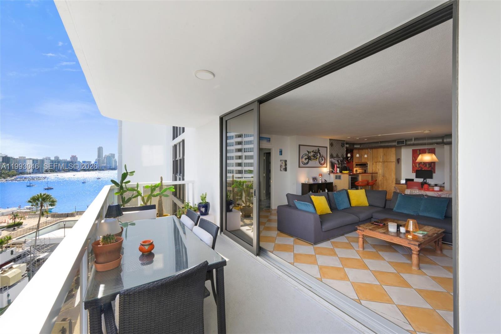 Experience premier South Beach resort living on Belle Isle in this wonderful 2-bed, 2-bath unit at the prestigious Nine Island Avenue Condominium. Enjoy breathtaking, panoramic views of Biscayne Bay and Miami Beach from your private balcony and new floor-to-ceiling impact windows. This bright, split-plan apartment features a spacious open-concept living/dining area, an updated kitchen with modern appliances, and ample closet space. Includes an in-unit washer/dryer. Enjoy luxury living in a full-service building: 24/7 security, valet, and recently updated common areas: modern gym, yoga room, and kids' room. A resort-style pool deck, spa, and tennis/pickleball courts are underway, along with marina slips (up to 48ft). Walkable to Sunset Harbour, Lincoln Road, and The Standard Spa.