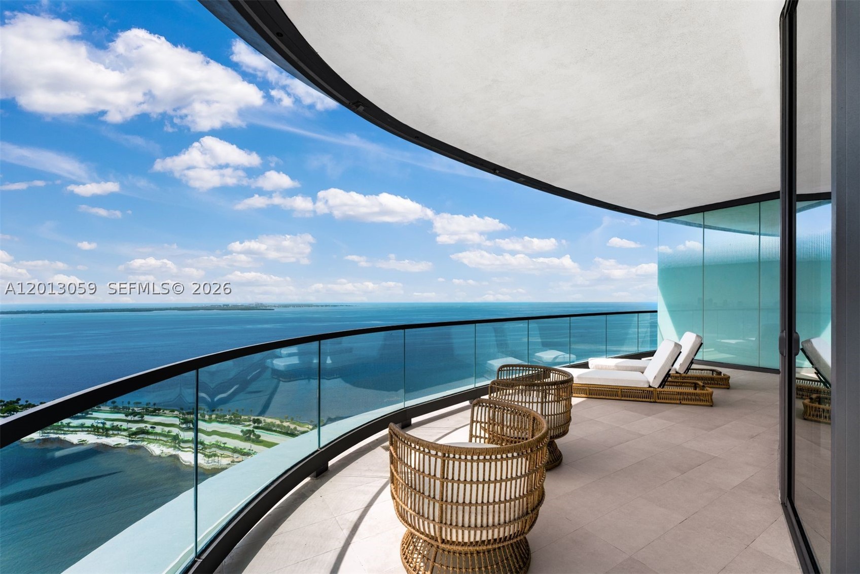 Perched high above Biscayne Bay in the iconic and newly completed UNA Residences, Residence 3601 is a breathtaking masterpiece where architecture, water, light, and design come together to create one of Miami’s most spectacular waterfront living experiences. With mesmerizing panoramic bay views, dramatic floor-to-ceiling glass, and extraordinary sunrise vistas that stretch endlessly across the horizon, this brand-new sky residence embodies the sophistication and glamour of Miami at its absolute finest. This exceptional 4-bedroom, 4.5-bath residence offers 2,743 SF under A/C plus 483 SF of expansive terraces, totaling 3,226 SF of seamless indoor-outdoor living. A private elevator entry opens into stunning open-concept living spaces inspired by the timeless elegance of luxury, blending warm natural materials with sleek contemporary design. The gourmet kitchen flows effortlessly into the grand living and dining areas and out to the waterfront terrace, creating the perfect setting for entertaining and enjoying Miami’s extraordinary bayfront lifestyle. Each bedroom is thoughtfully positioned to maximize privacy while capturing breathtaking water views from nearly every room. Residents enjoy world-class amenities including resort-style pools, spa and wellness facilities, state-of-the-art fitness center, elegant bayfront lounges, and curated social spaces, all within one of Brickell’s most prestigious new waterfront addresses.