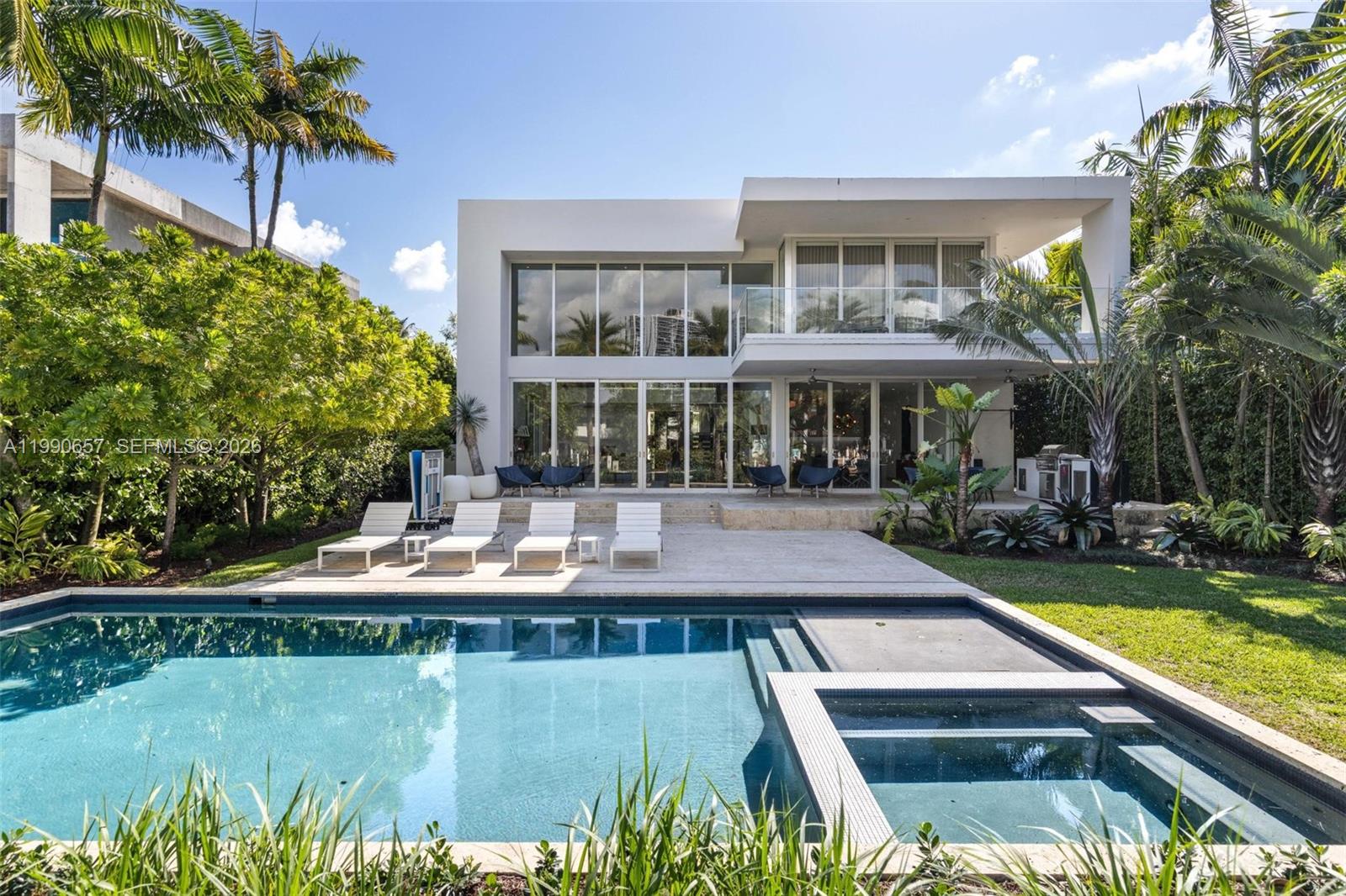 Exceptional waterfront estate in the exclusive guard-gated community of Golden Beach. Built in 2016, this state-of-the-art residence offers 6 bedrooms, 7.5 bathrooms, plus a private study.
Designed for both comfort and sophisticated living, the home features expansive living areas, high ceilings, and abundant natural light throughout. Top-of-the-line finishes include marble and wood floors, a spectacular chef’s kitchen with high-end appliances and quartz countertops, smart home technology, and a private elevator.
Seamless indoor-outdoor living leads to a beautifully designed outdoor space, perfect for entertaining, with a pool, lush landscaping, and 75 feet of prime waterfront. Oversized 55-foot private dock with ocean access.
Golden Beach residents enjoy private beach access, tennis courts, parks, and 24/7 security. A rare opportunity to own in one of South Florida’s most prestigious communities.