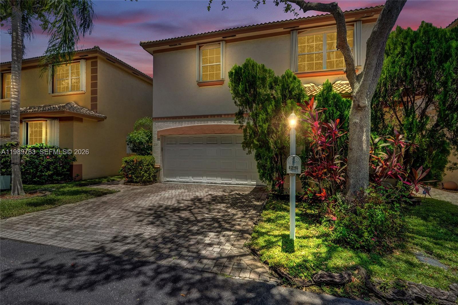 Welcome to your serene sanctuary in the highly sought-after gated community of San Marino Village. This impressive two-story residence offers 3 bedrooms and 2.5 bathrooms, perfectly designed for modern living. Upon entering, you are greeted by soaring high ceilings that create an expansive, sun-drenched atmosphere throughout the home. The thoughtful layout includes a versatile open loft on the second floor, which can easily be converted into a 4th bedroom, home office, media room, or play area offering flexibility to fit your lifestyle. Residents of this exclusive community enjoy access to a sparkling pool and a peaceful environment while remaining minutes away from South Florida’s best attractions. Adventure awaits at nearby West Lake Park, where you can explore scenic trails, enjoy kayaking, and access the Intracoastal. The home’s prime location offers unparalleled convenience, situated just minutes from the world-famous Hollywood Beach and Boardwalk, ArtsPark at Young Circle, and a vibrant array of dining and entertainment options. Commuting is effortless with quick access to major highways including I-95 and I-595. Whether you are seeking outdoor recreation or urban excitement, this property delivers the perfect balance of luxury and location.