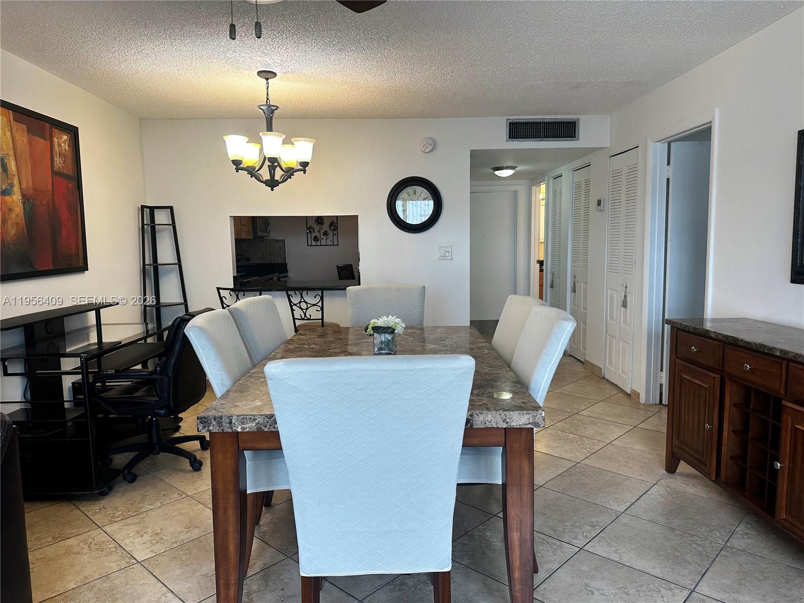 Location, Location, Location! Beautifully remodeled and fully furnished 1-bedroom, 1.5-bath condo located just across the street from The Village at Gulfstream Park in Hallandale Beach. Close to shopping, dining, and the beach. The unit features stainless steel appliances, granite countertops in the kitchen, and ceramic tile flooring throughout. Plenty of storage and comfortable living areas. 1 parking space included and gust parking available. The building includes a secured lobby, community laundry facilities. Great amenities to include a large pool, picnic area with BBQ, and clubhouse. 55+ community — at least one resident must be 55 or older. Make an offer!