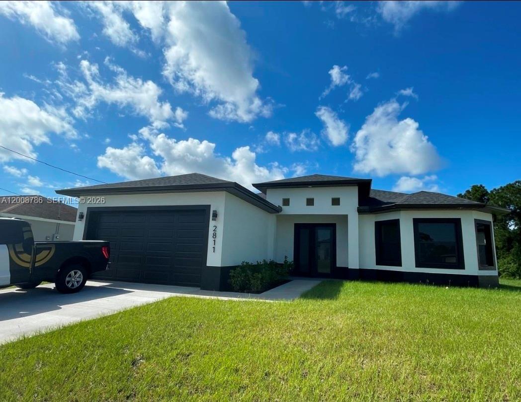New Construction to be finished in June!Imagine waking up every day in your beautifully designed 3-bedroom, 2-bathroom home with a dedicated den-office, perfectly positioned in North Port—one of Florida's top-ranked BoomTowns and fastest-growing cities that's redefining modern living along the Gulf Coast. This isn't just a house; it's your gateway to an exceptional lifestyle where lush green spaces meet unparalleled convenience, with pristine beaches like Englewood and Manasota Key just 35 minutes away, world-class shopping and dining at your doorstep, and highly-rated schools that ensure your family's success. Great infrastructure investments launching in late 2026, positions this property as a smart wealth-building opportunity whether you're seeking your forever home or a high-performing rental investment in a market averaging $2,000 monthly rents with strong demand. The den provides flexible space for remote work, a creative studio, or guest accommodation,adding incredible versatility that today's renters and buyers crave.With property values steadily appreciating in this thriving corridor between Sarasota and Fort Myers,near I-75, and the lifestyle trifecta of beaches, recreation, and amenities, this home offers the perfect balance of comfort, convenience, and capital growth potential. Don't miss your chance to own a piece of Florida's future in a community designed for those who refuse to compromise on quality of life or return on investment