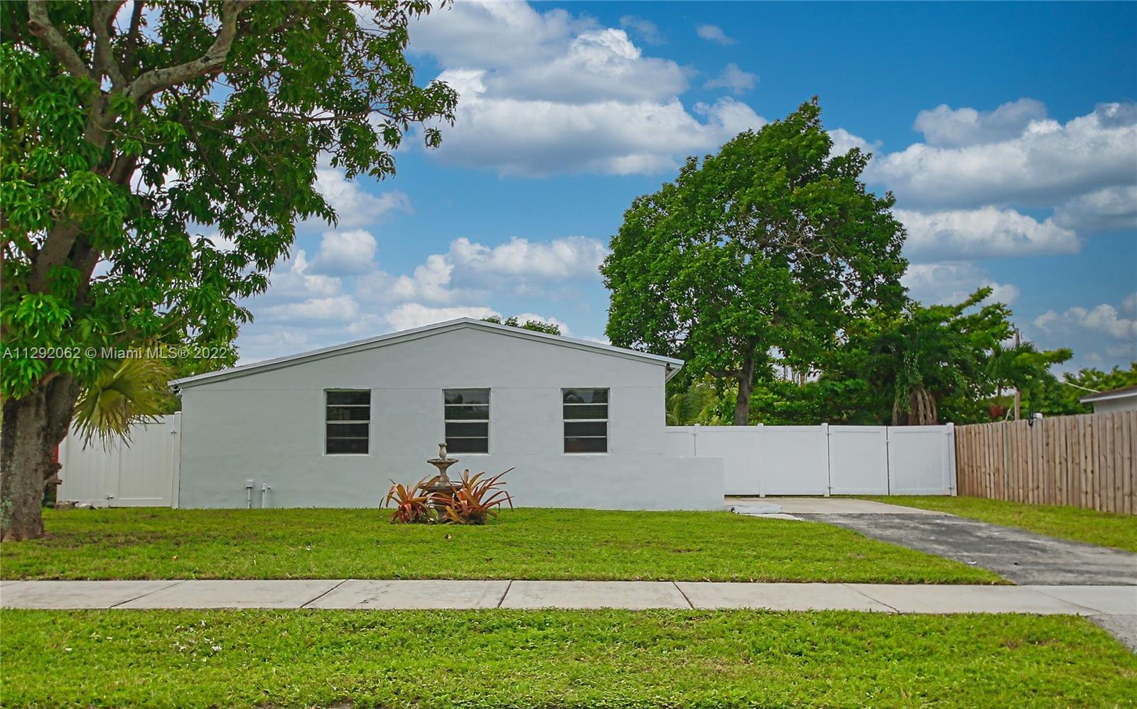 This home is move-in ready and waiting for its new owners to arrive! This home boasts a BRAND-NEW ROOF with 10-year warranty, new hot water on demand system and new AC system in 2017. This home has an oversized 10,000 square foot lot with double entry for easy Boat or RV access, room for toys and still leaves room to add a pool. Want to add a second bathroom? Extended roof and plumbing are in place to add a second bathroom where the laundry is located. Location! Location! Location! Situated near shopping, dining and just minutes to I75 and approximately 15-minute drive to S Ocean Dr for beach days and enjoying Hollywood Broadwalk with endless options for boutique shopping and dining. 30-minute drive or less to Ft Lauderdale airport and approximately minutes to South Beach!