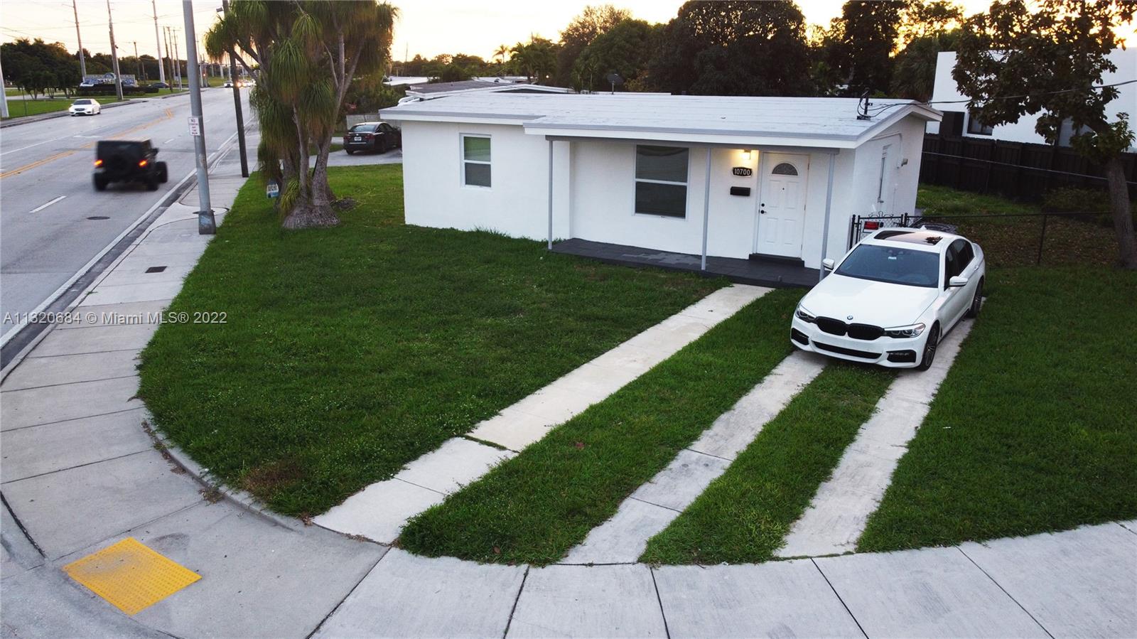 Location, Location, Location. This adorable home has been completely renovated including all mayor points considered. It has a new roof, tile floors, bathroom and new central A/C. Great laundry room with no association for this corner lot home. If that wasn't enough, property comes with a shed in the backyard.