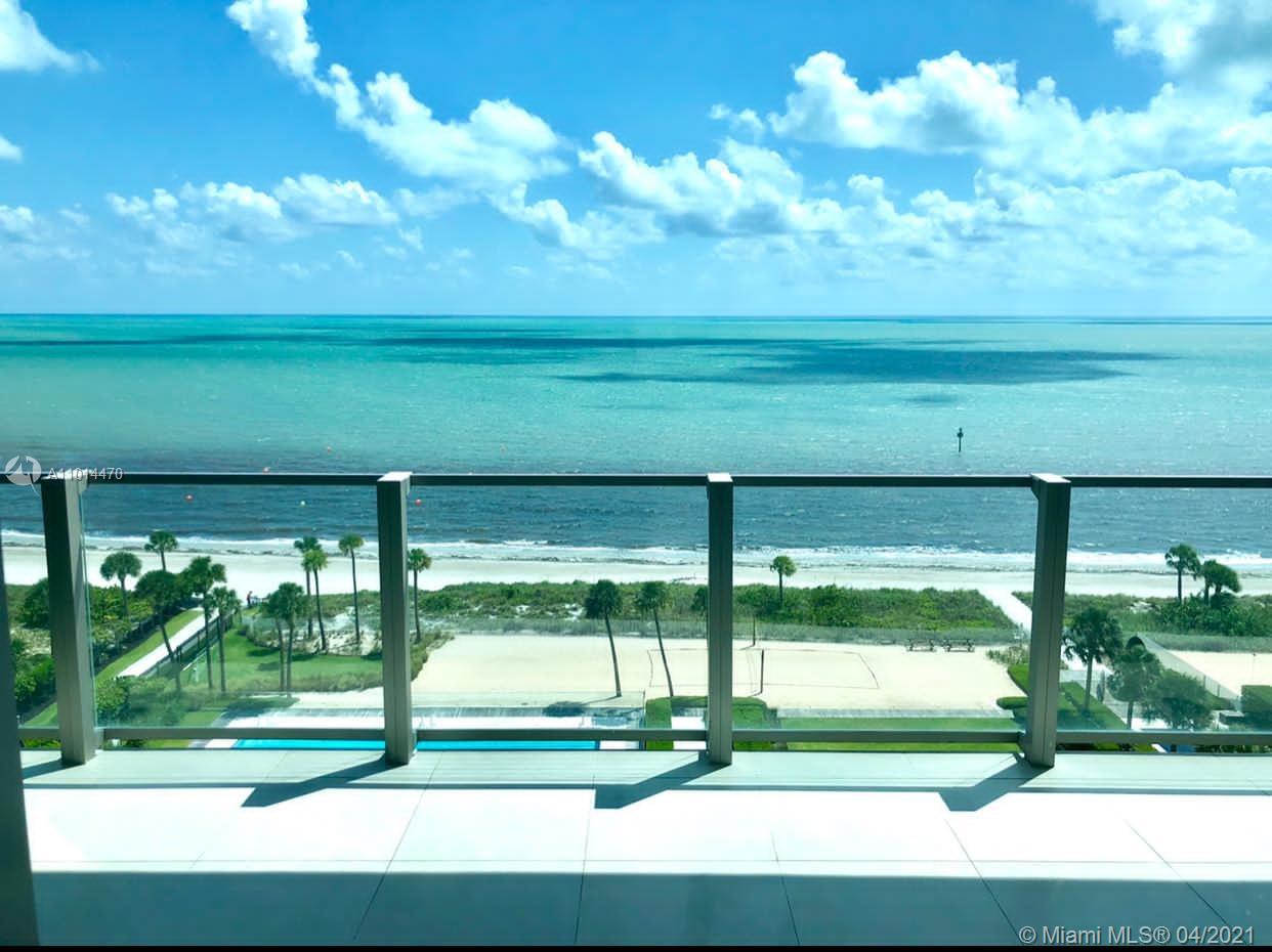 The newest building in Key Biscayne. One of the kind luxury Beach front property. Oceana is a Green/LEED- certificated building. Amazing flow through unit with unobstructed views to the ocean and intercoastal. A resort style living 5 star amenities that it has offer such a 500-feet private Beach, Restaurant with Beach and Pool service for residents. The kitchen features quartz counter tops, double oven, wine cooler, Miele appliances and Euro-Style cabinets. Tennis Court, Ocean View Fitness Center, Lap Pool, Spa services, 24-hour concierge, Party room, Children's center.