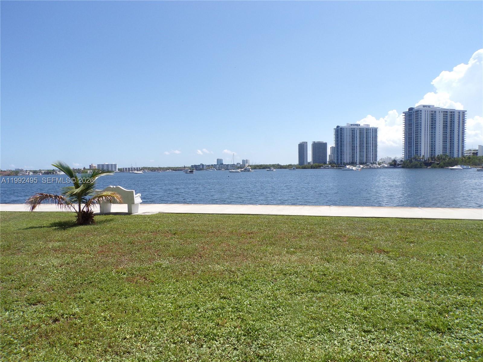 AMAZING WATERVIEW, RELAX AND ENJOYTHE WATERVIEW FROM THIS SCREENED BALCONY, LIVINGROOM, DININGROOM & BEDROOM AREAS.JUST SIT BACK IN THE BALCONYAND WATCH THE YATCHS & SAILBOATS PASSED BY. THIS UNIT IS READY TO MOVE IN - KITCHEN OPENED, UPGRADED BATHROOM, TILE FLOORAND NEW CARPET IN THE BEDROOM. PARKING IN FRONT OF YOUR UNIT. THIS IS AN ACTIVE  55+ COMMUNITY WITH MANY AMMENITIES: CLUBHOUSE, DANCING, MOVIES, BILLARDS, 
5 POOLS, GYM, BINGO, BOCCE, 2 MILES OF WLAKING PATH AROUND THE LAKE, AVENTURA COURTESY BUS, AND MUCH MORE... CLOSE TO RESTAURANTS, SHOPPING MALL, GROCERY, SHORT DRIVE TO THE BEACHES. HAVE 2 SMALL ASSESSTMENT ONE FOR $13.67 AND A SECOND ONE FOR$24.64 BOTH ALREADY INCLUDED IN THE MONTHLY MAINTENANCE FEES OF $587.31 NO RENTALS FOR FIRST 18 MONTHS. NEW REDUCED PRICE
