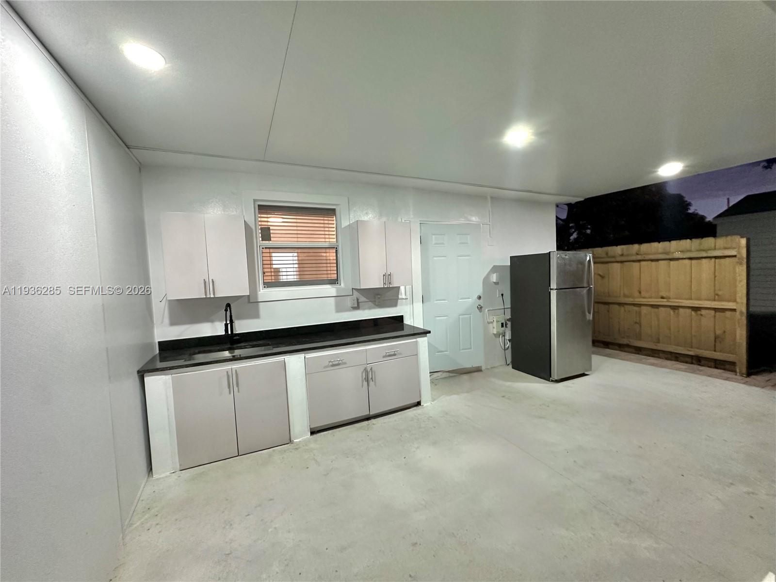 2 bedroom 1 bathroom home! The property offers a private outdoor kitchen with a stove, providing a functional and flexible living setup! Located behind a single-family home, this unit provides privacy and a quiet residential setting! Clean, bright interiors, and modern finishes make this home ideal for tenants seeking comfort and versatility. Owner will install stove prior to move in.