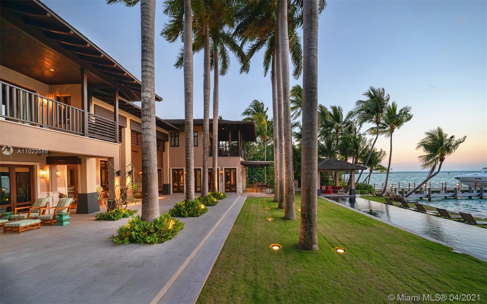 Welcome to one of the most refined waterfront residences in Florida. Nestled in The only private road of Key Biscayne, this magnificent home sits on an oversized lot with direct Biscayne Bay and Miami skyline views. Extremely sophisticated Bali style home designed by CMA Design Studio, top of the line materials, Lutron system with recess lighting that creates a perfect setting for the interior of the residence. Formal dining, butlers pantry, adjacent to the upscale kitchen (gas stove) and breakfast area with direct access to the covered patio with Jasmin climbing vine, large guest suite on garage second floor. Total of 8 bedrooms. Third-floor loggia family room. Double stair access. Expansive covered terrace and gazebo by the pool. Private dock. Boatlift. Private and gated. Generator.