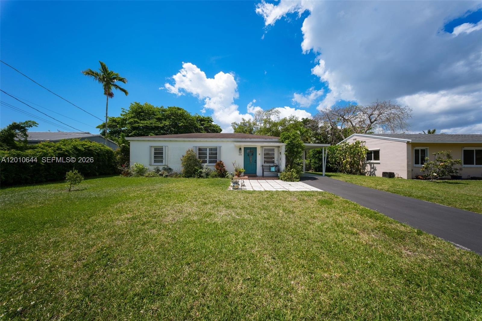 Bright 3-bedroom, 2-bath single-family home ideally situated in a prime location near Coral Gables and the Palmetto Expressway. Tucked away on a quiet cul-de-sac with no HOA, this property offers both privacy and convenience. Enjoy a spacious yard filled with mature fruit trees—perfect for outdoor living, gardening, or entertaining. The serene canal view adds a peaceful backdrop, creating a relaxing retreat right at home. A rare opportunity to own a well-located property with charm, space, and no association restrictions.