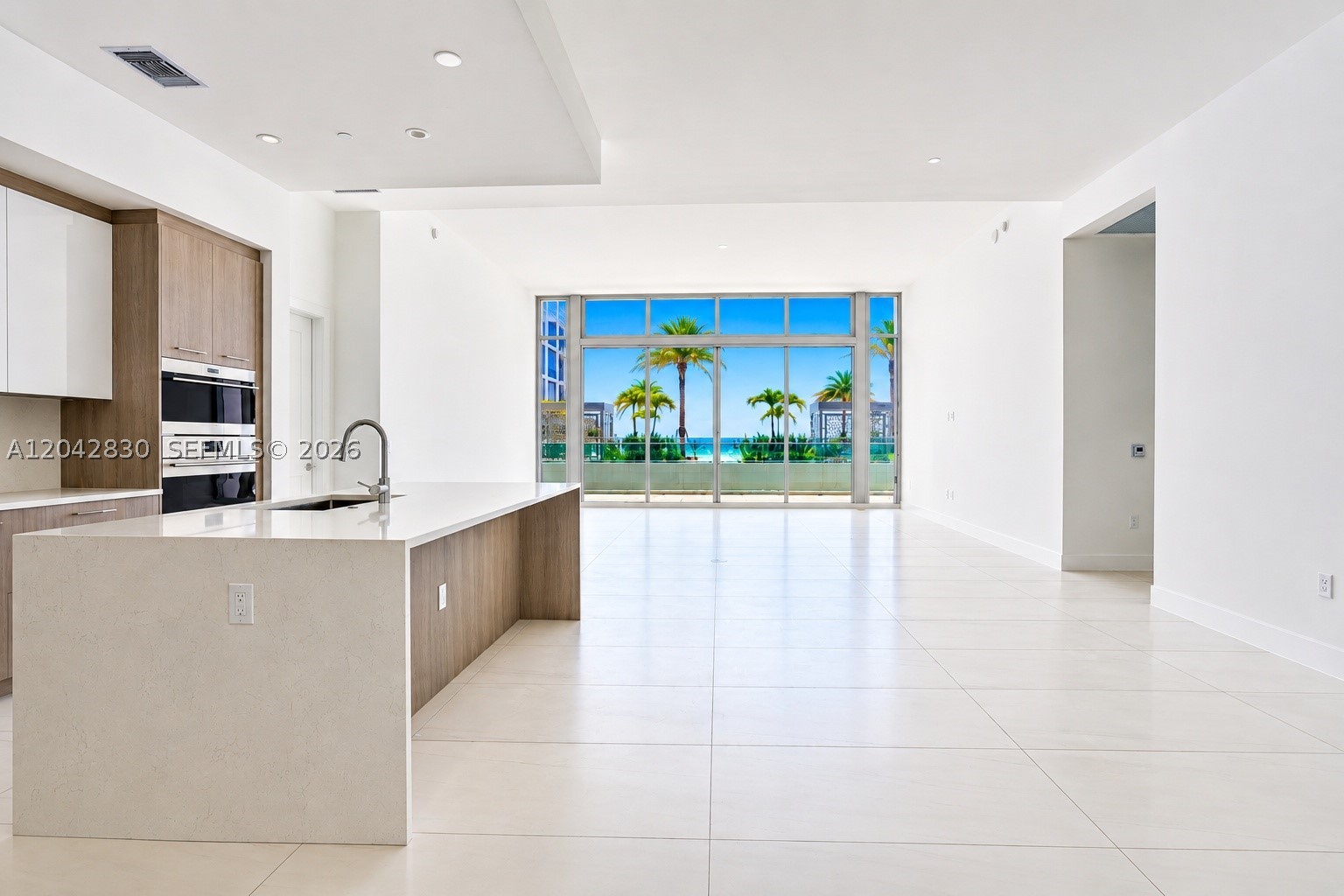 Welcome to Selene Oceanfront Residences—Fort Lauderdale Beach's newest landmark of ultra-luxury waterfront living. This brand-new Azure Residence offers 2 bedrooms + den, 3.5 baths, and 2,817 total SF (2,395 SF under air + 422 SF private terrace), designed for those who expect nothing but the best. Walls of floor-to-ceiling glass flood the home with natural light while showcasing breathtaking Atlantic Ocean and city views. Soaring 14' ceilings, expansive open living spaces, and a private terrace create an effortless indoor-outdoor lifestyle. The designer kitchen is appointed with European cabinetry, quartz countertops, Wolf® appliances, and Sub-Zero® refrigeration. The luxurious primary suite features terrace access, oversized walk-in closets, and a spa-inspired bath designed for total relaxation. Perfectly positioned across from award-winning Las Olas Beach and moments from Las Olas Boulevard, you'll enjoy world-class dining, shopping, marinas, and entertainment just minutes away. Selene delivers an unmatched five-star lifestyle with resort-style pools, a 75-foot lap pool,  spa, state-of-the-art fitness center, yoga studio, theater, elegant resident lounges, private dining room, business center, concierge, 24-hour valet, on-site management, direct beach access, and an oceanfront restaurant. This is more than a residence—it's one of South Florida's most coveted beachfront lifestyles. An exceptional opportunity to own in Fort Lauderdale's most exciting new luxury address.