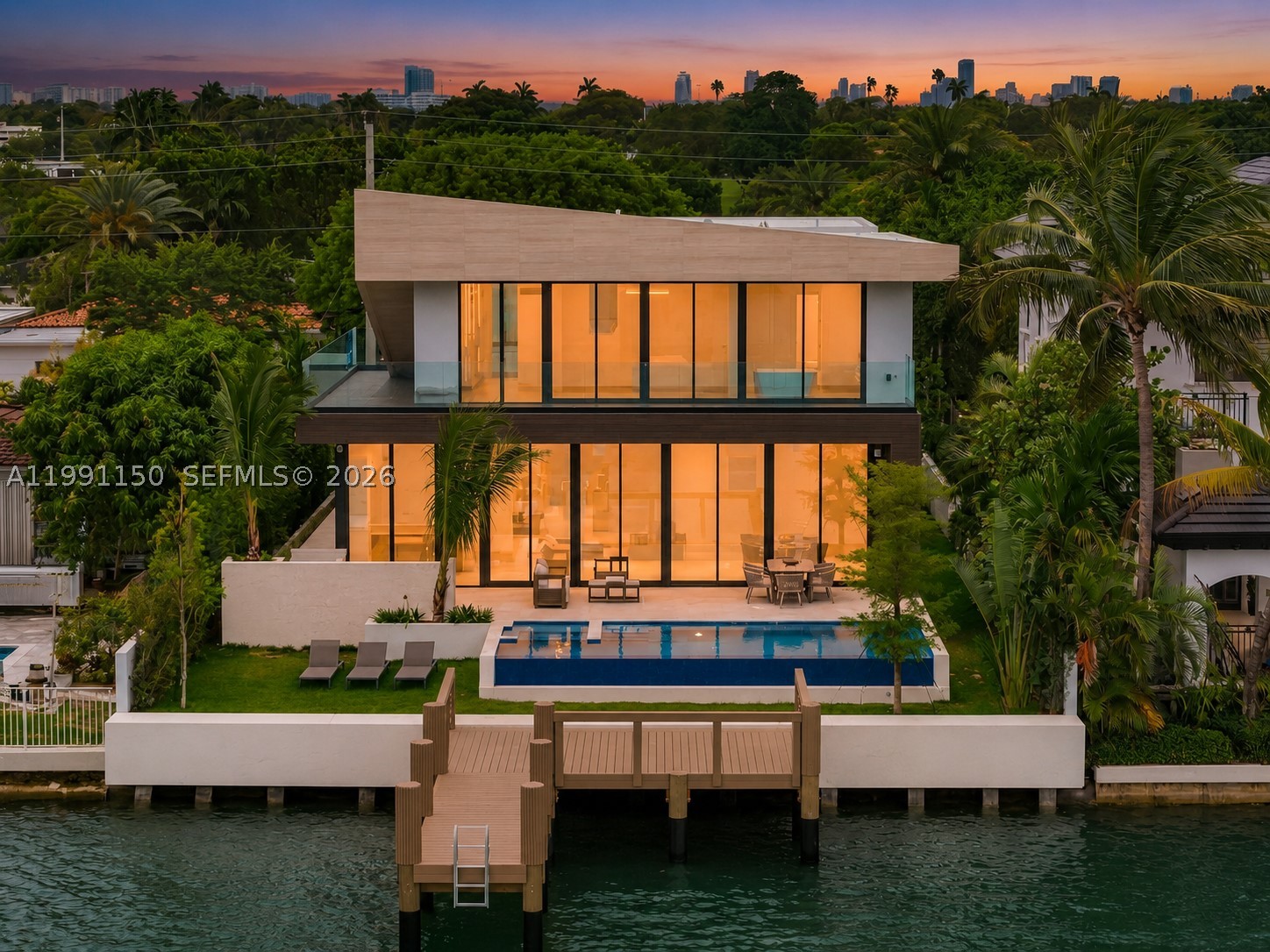 Introducing an extraordinary waterfront sanctuary in Miami Beach’s exclusive Normandy Shores. This stunning residence features top-of-the-line Miele appliances, exquisite marble floors, and a striking illuminated marble vanity, all complemented by soaring high ceilings that fill the home with light and elegance.

Enjoy a lifestyle of unmatched luxury with access to premier amenities, including a golf course, clubhouse, restaurant, outdoor gym, and tennis courts. With breathtaking open bay views and direct ocean access, this home is a dream for boating enthusiasts and lovers of waterfront living.

Experience the pinnacle of Miami Beach luxury living.