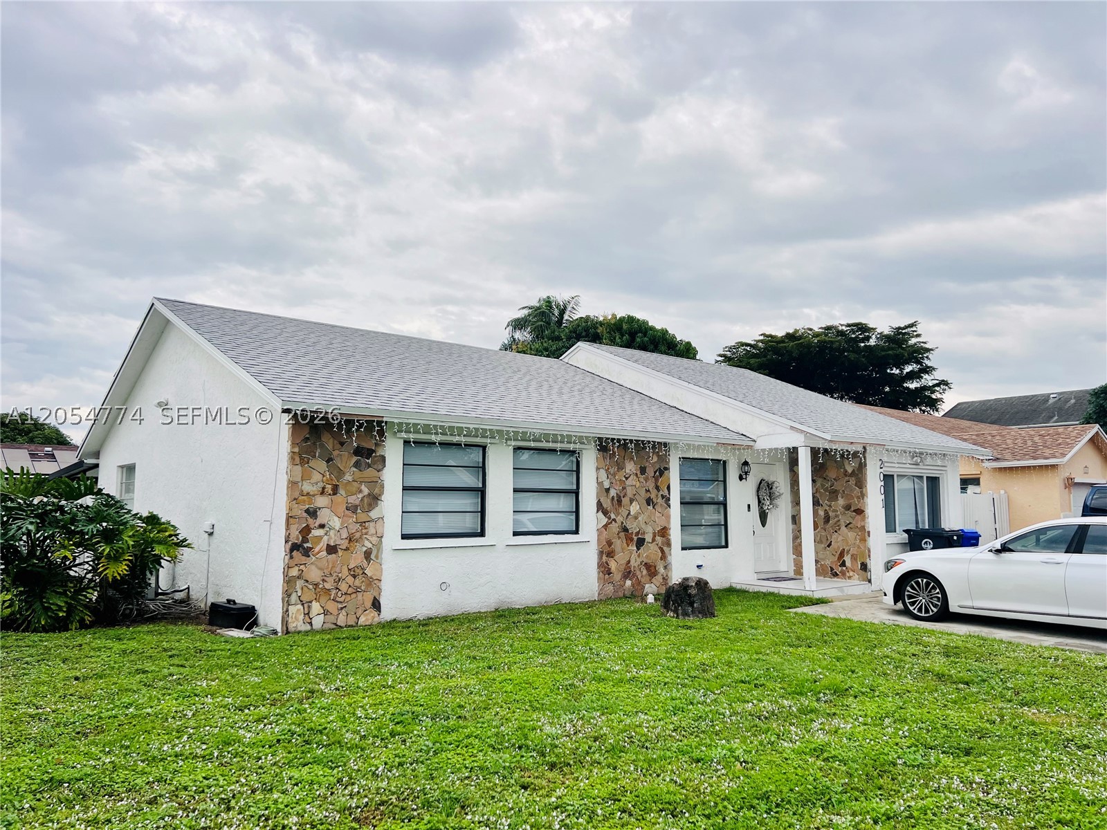 Beautifully updated pool home in the desirable Burnham Woods community of North Lauderdale! This move-in-ready residence offers the perfect blend of style, comfort, and versatility. Featuring beautiful porcelain tile flooring throughout, the home showcases a bright, modern feel. Two bathrooms have been tastefully remodeled with contemporary finishes, and the roof was replaced in 2023, providing added value and peace of mind.
This unique home offers exceptional flexibility with a converted garage featuring its own private entrance, ideal for guests, extended family, or a home office. In addition, the spacious Master Bedroom has been configured as a separate guest suite with its own private entrance and can easily be converted back to its original primary suite layout if desired by the new owner.
Step outside to your private backyard featuring a sparkling pool, perfect for entertaining, relaxing, and enjoying the South Florida lifestyle year-round. Conveniently located near parks, schools, shopping, dining, and major highways, this beautifully maintained home offers comfort, convenience, and endless possibilities. 
Don't miss this incredible opportunity!