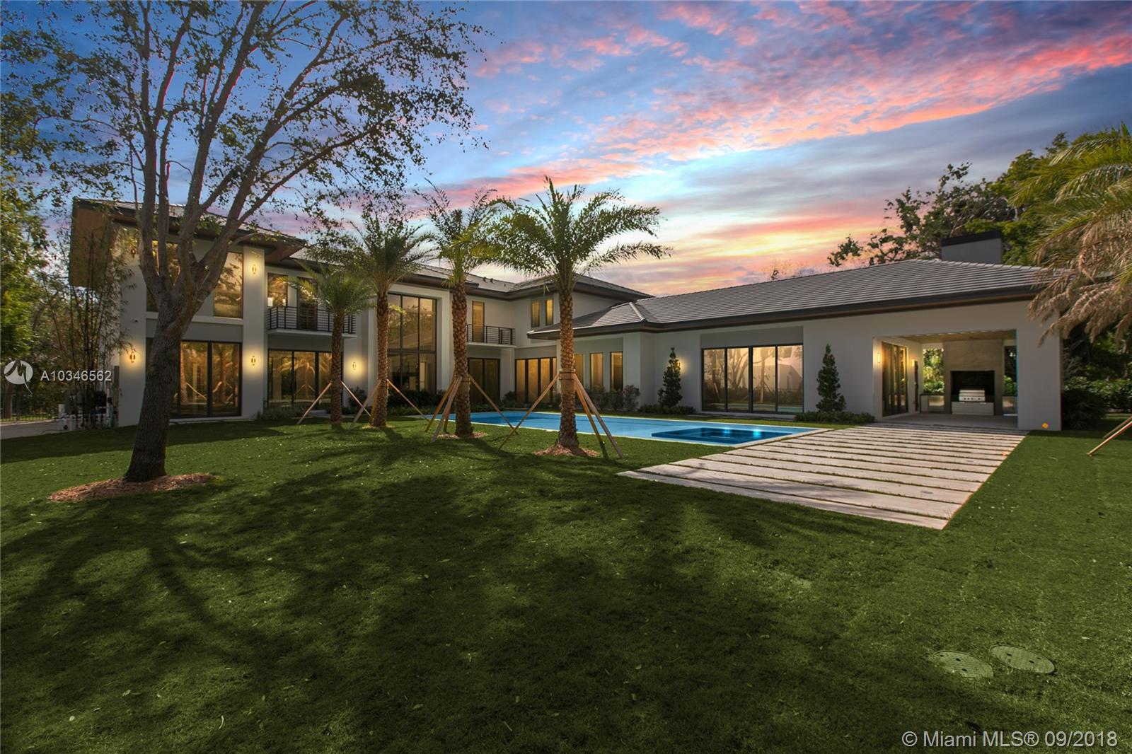 HOME RECENTLY STAGED -Completed in 2018 and masterly designed by Corwil Architects and quality construction by ICH builders on a builders acre . This 9,047 SF residential estate is spread over 6 bedrooms and bonus room, and 7.5 bathrooms featuring limestone and hardwood flooring throughout.Boasting high-end Mia Cucina Italian custom kitchen cabinetry, with Subzero and Wolf appliances, no expense has been spared.
Featuring smart home technology, personal elevator, double-height ceilings with floor-to-ceiling glass and resort-style maturely landscaped grounds, the exterior climate control pool with Jacuzzi, fully equipped outdoor kitchen, this magnificent residence exemplifies South Florida's luxury entertaining lifestyle.