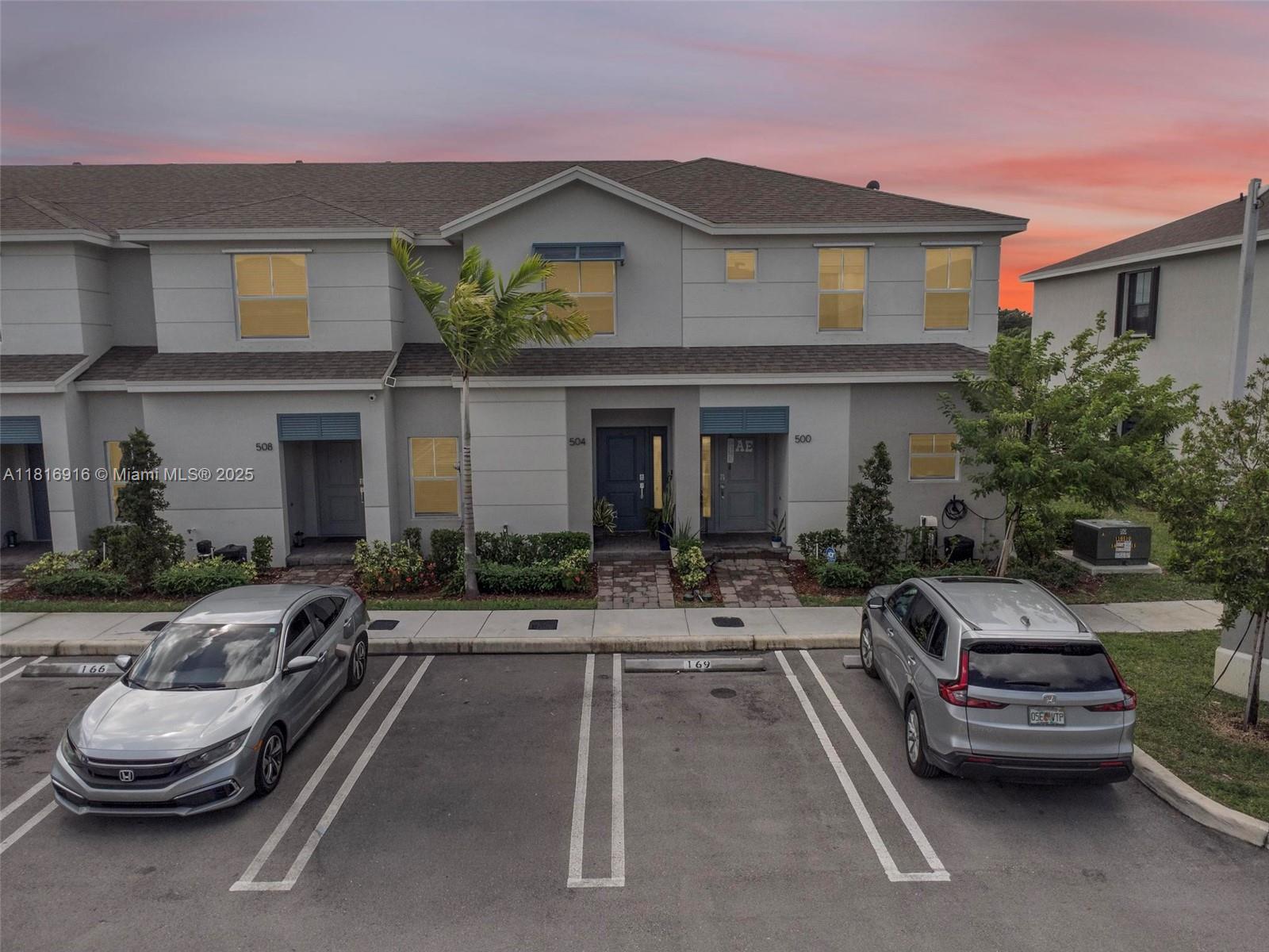 Experience the beauty and spaciousness of a magnificent new townhome in Florida City at the ISLES of Sebastian. With a custom aluminum roof adorned with LED lights, this home is designed for joyful gatherings and entertainment. The hurricane impact doors ensure safety while the open kitchen concept welcomes warmth and family connections. A full bedroom and bathroom on the ground floor create a perfect haven for grandparents. The elegant tiled flooring flows gracefully throughout the entire first floor, while all upstairs bedrooms feature attached bathrooms, adding to the home’s charm and convenience. Nestled near the breathtaking Biscayne National Park and the vibrant Florida Keys, along with convenient busways and shopping centers, this property is truly a gem.
