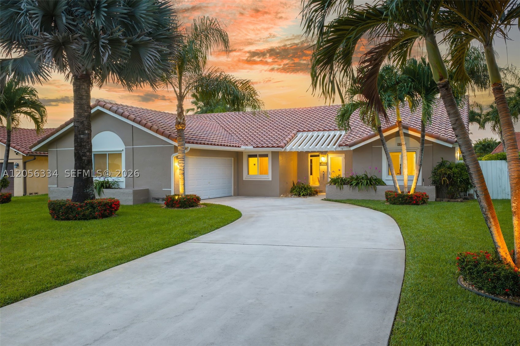 Welcome home to this beautifully maintained 3-bedroom, 2-bath residence nestled on a quiet cul-de-sac street in a sought-after Davie neighborhood, offering privacy with no through traffic. Designed with both comfort and functionality in mind, this move-in-ready home features a spacious split-bedroom floor plan, with the private primary suite located on its own side of the home. The primary bedroom has a large custom closet and is complemented by a beautifully renovated bathroom with dual sinks and step-down shower.  The kitchen is the heart of the home, offering granite countertops, stainless steel appliances, and an open layout that flows into the living areas. Vaulted ceilings and an abundance of windows fill the home with natural light, creating a bright and inviting atmosphere. One of the secondary bedrooms features a built-in Murphy bed.  Travertine and tile flooring, custom closets, and hurricane impact windows and doors add style, quality, and peace of mind throughout. Step outside to your own tropical backyard oasis featuring a sparkling saltwater pool and covered patio, ideal for family gatherings, weekend barbecues, or relaxing in the South Florida sunshine. An over-sized driveway and 2-car garage provide plenty of parking. Conveniently located near I-75, Cleveland Clinic, parks, shopping, dining, and top-rated A+ schools, this exceptional home also offers the benefit of a very low yearly HOA.  Don't miss the opportunity to make this wonderful home your own!