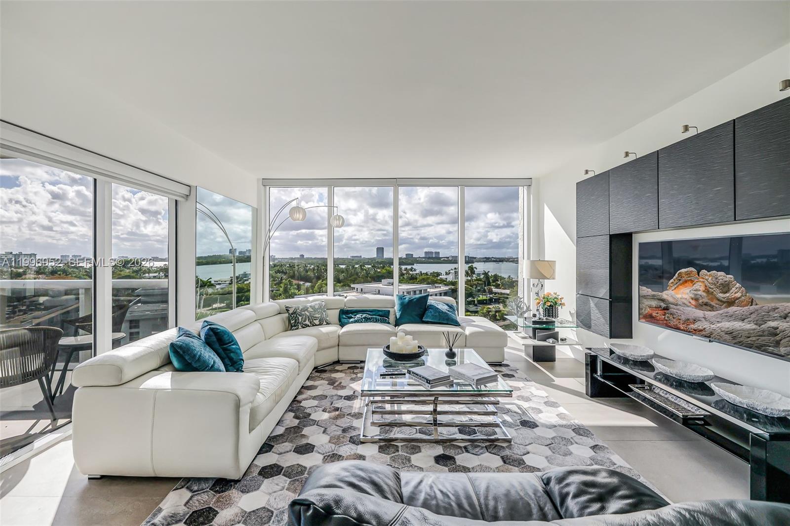 Stunning corner residence at Harbour House, one of Bal Harbour's most coveted full-service beachfront buildings. Thoughtfully remodeled to create a spacious 3-bed/2.5-bath layout with 1,300 sq ft of refined living. Sleek ceramic floors, premium appliances, and upscale finishes throughout. Breathtaking bay views from the main living areas with ocean views from the dining room and balcony — the best of both worlds. Available furnished or unfurnished. Building amenities include valet parking, 24-hour concierge, oceanfront pool and jacuzzi with private cabanas, health spa, fitness center, on-site café/market, social room, and theater. Private beach access steps away, next to the Ritz-Carlton Residences, with full beach service. Recently renovated lobby and hallways. Walking distance to the world-renowned Bal Harbour Shops and Miami's finest dining. Minutes to Aventura Mall, South Beach, and both international airports. A rare opportunity to own one of the most exclusive addresses on Miami's barrier island.
