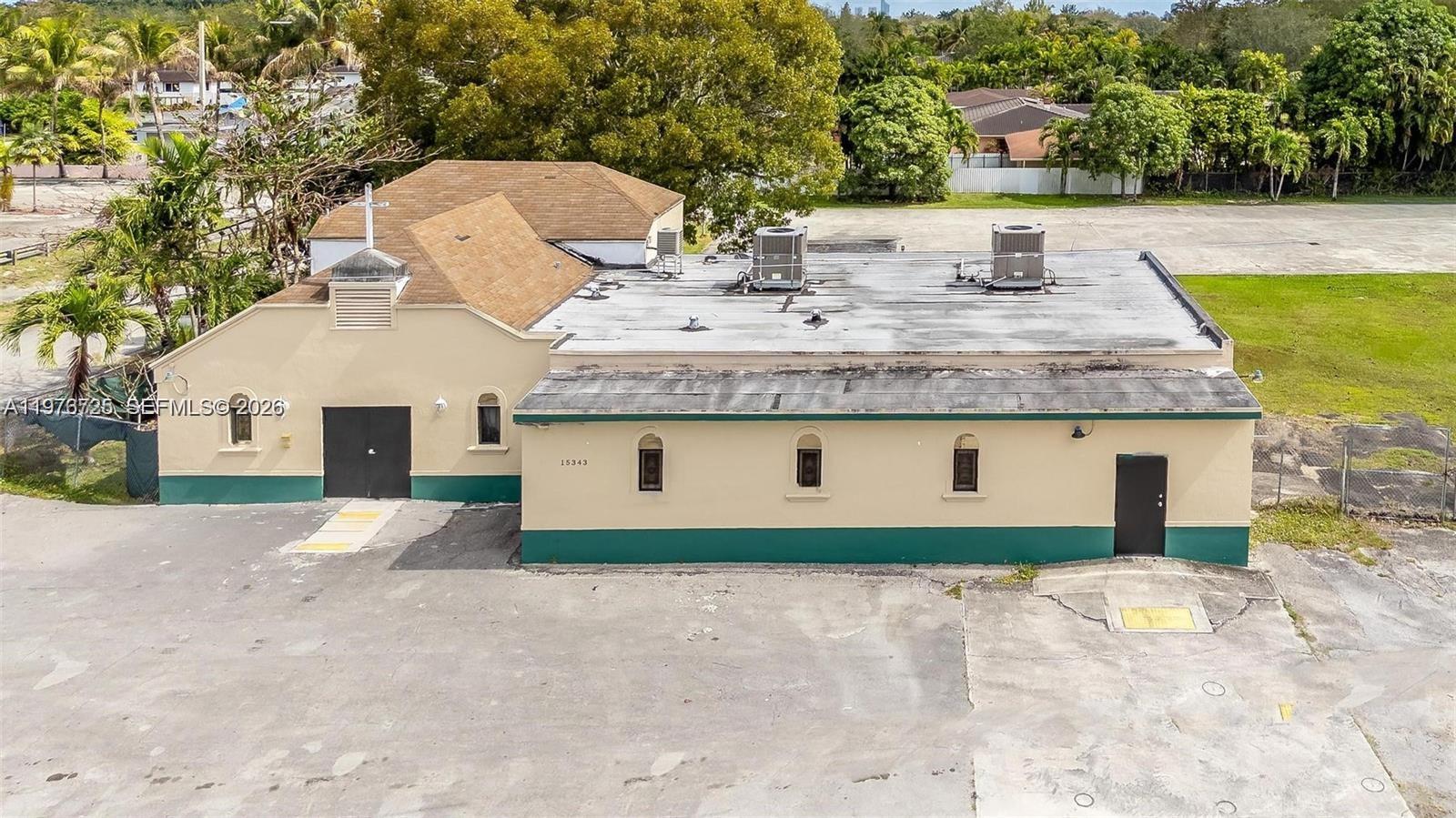 Development opportunity in Biscayne Gardens - This 1.40-acre site totaling 60,700 SF is well-positioned for future development. The building is currently operating as a church and can accommodate up to approximately 500 people. Located on a prominent corner lot, the site offers strong visibility and easy access. Buyers can explore the potential for rezoning; opportunities like this in the area are uncommon.