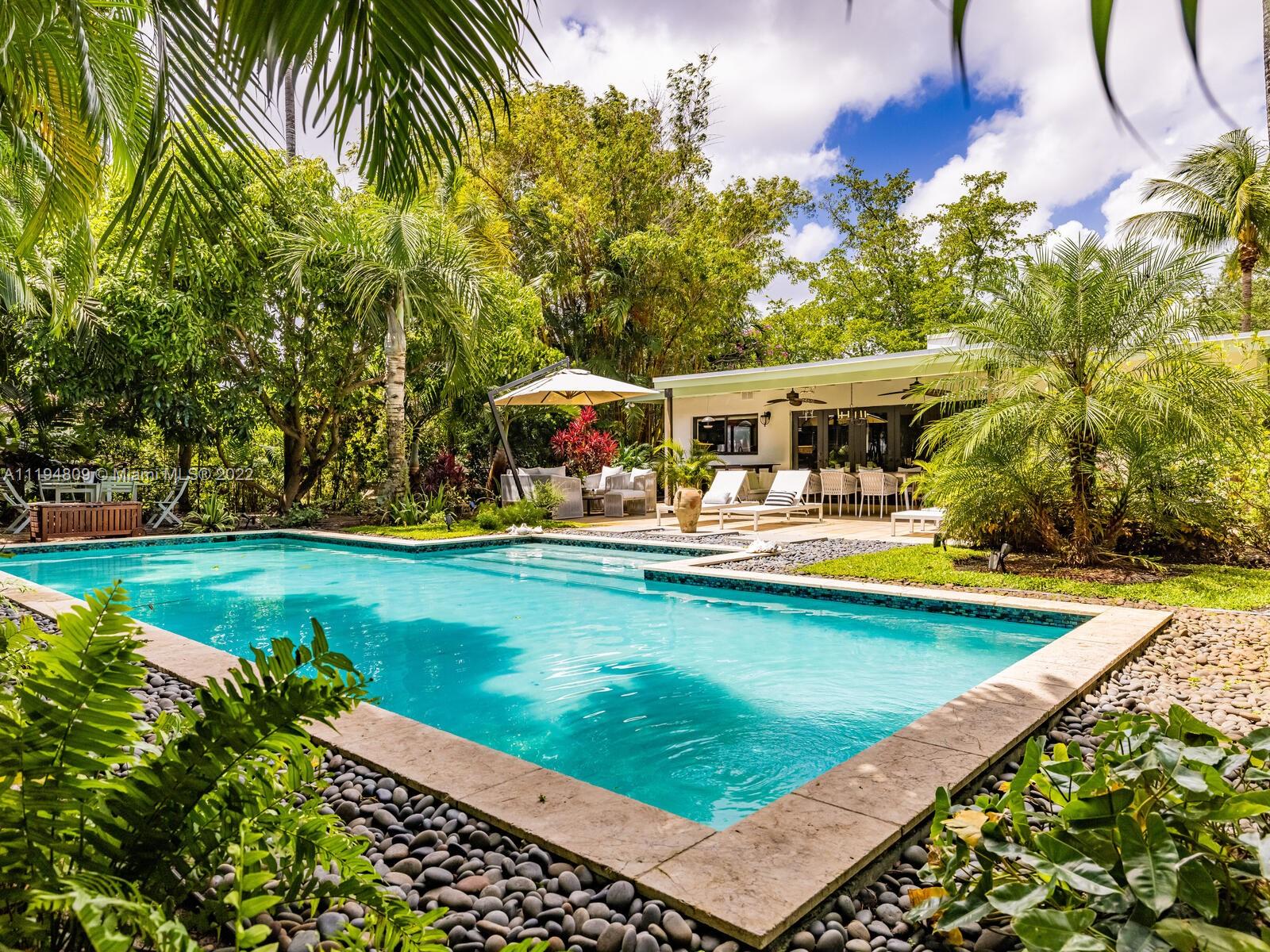 A true tropical escape, this beautifully furnished 3bed/2bath pool home is an entertainer’s dream with a wide open living/dining/kitchen area with doors to the large and lushly landscaped backyard oasis complete with an oversized heated pool and covered terrace. Located on a serene tree-lined street just one block from Downtown Miami Shores, this charming home features a formal living room/foyer, a bright office space, a large chef’s kitchen with gas range and chic butler’s pantry, a luxurious main suite with doors to the garden, a conveniently roomy laundry space and a one-car garage. Fully appointed; just bring your suitcase! Available starting May 20th for a 6-month Lease maximum.