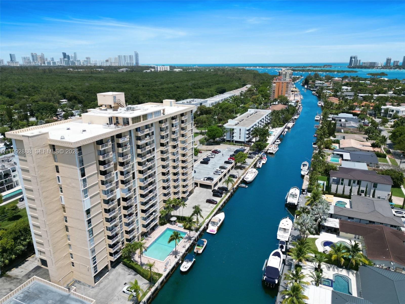 Experience premier waterfront living in prestigious Keystone! This renovated 1-bed, 1-bath condo offers 723 sq.ft. of comfort and stunning views. Sleek kitchen with stainless steel appliances flows into the living/dining area, while floor-to-ceiling windows and balcony showcase 180-degree views of Biscayne Bay, Oleta State Park, Aventura and Sunny Isles Beach. The bedroom boasts a walk-in closet plus two additional closets for ample storage. Enjoy resort-style amenities: a waterfront pool, gym, sauna, secured parking, and laundry on every other floor. BOAT SLIPS AVAILABLE–INQUIRE TODAY! Ideally located minutes from Whole Foods, Publix, Walgreens, Home Depot, top dining, Aventura Mall, and pristine beaches. Blocks from FIU—the heart of it all! Don't miss out—schedule your showing today!