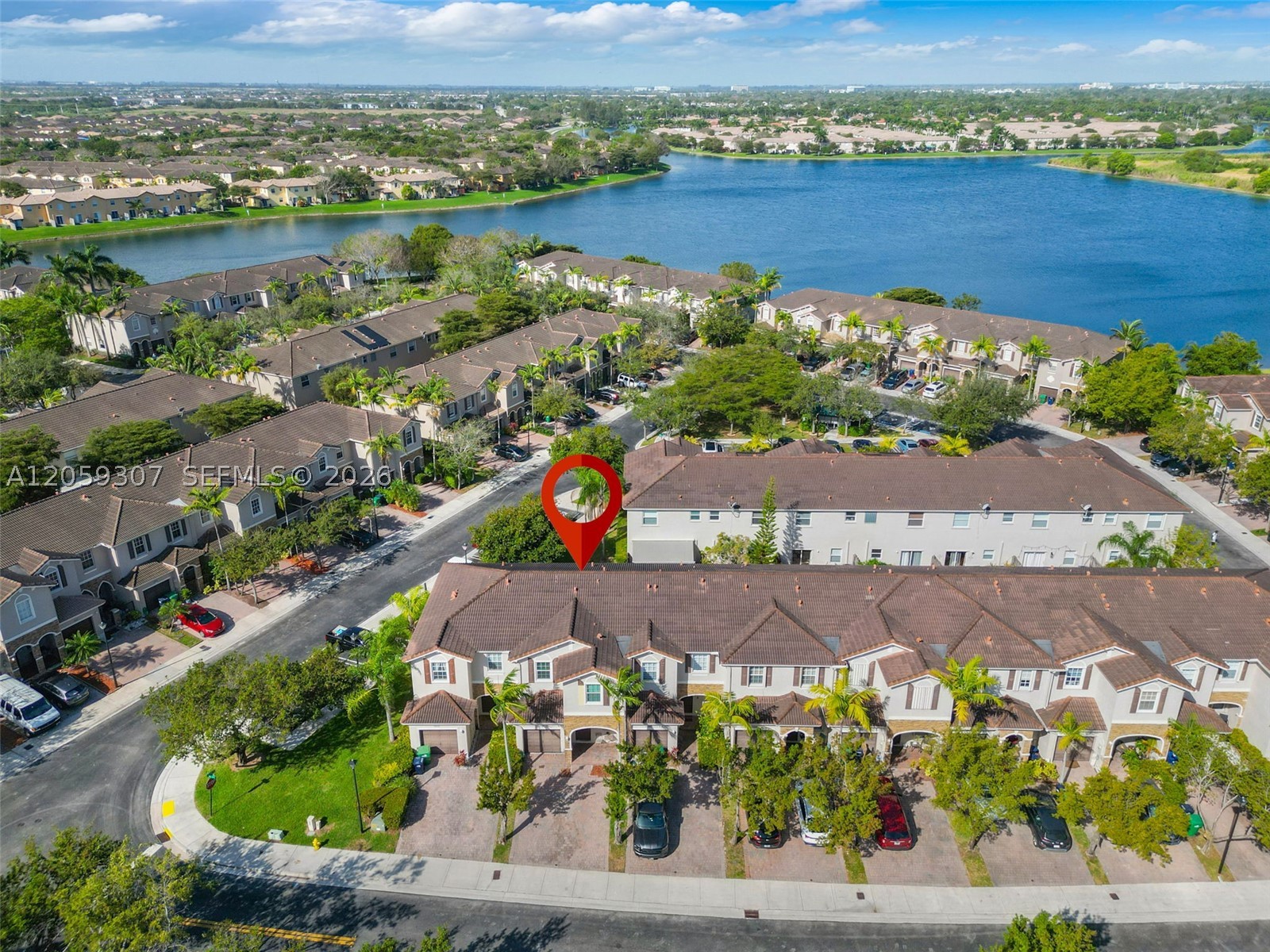 Discover this beautifully maintained townhouse located in the desirable Lakes by the Bay community. This home features a bright and open floor plan filled with natural light, offering spacious living and dining areas ideal for everyday living and entertaining. Enjoy your private fenced patio—perfect for relaxing, hosting guests, or outdoor dining. The community offers resort-style amenities including a pool, clubhouse, and on-site security. Conveniently located near major highways, shopping, and dining. A fantastic opportunity you don’t want to miss—schedule your private showing today!