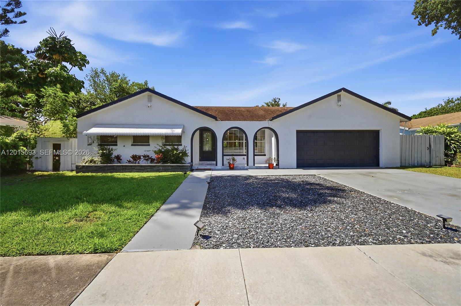 GREAT VALUE! HOME IN BOCA RATON, NO HOA. A+ RATED SCHOOLS. GREAT OPPORTUNITY TO OWN THIS MODERN  3 BED/2 BATH/2 CAR GARAGES, POOL W/ A CHARMING BACKYARD RECENTLY UPDATED. ENJOY THE FLORIDA LIFESTYLE  IN YOUR OWN  PEACEFUL BACKYARD WITH AN SPECTACULAR NATURE'S VIEWS. PERFECT FOR FAMILY GATHERING.  THE FRONT OF THE HOUSE HAS BEEN UPDATED GIVING IT A BEAUTIFUL SPANISH STYLE TOUCH. THE LIVING  & DINNIG AREA IS AN OPEN CONCEPT. KITCHEN HAS NEW S.S APPLIANCES, INCLUDING WASHER & DRYER.MACHINE. THE SPRINKLER & THE POOL SYSTEM ARE NEW AS WELL THE A/C. THIS RESIDENCE IS SITUATED NEAR MAIN HIGHWAYS AND ROADS, HOSPITALS SHOPPING, RESTAURANTS, PARKS ETC