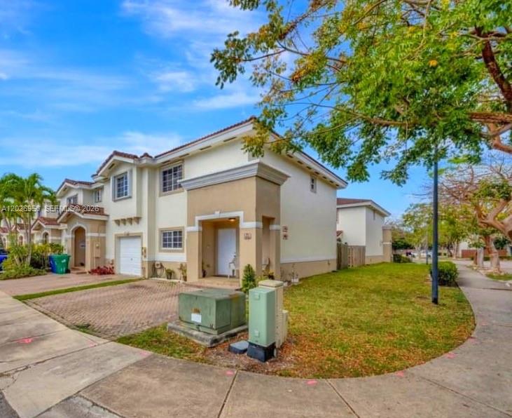Beautifully maintained townhouse located in the quiet, gated community of Cedar Homes. This spacious residence features two primary suites, each with its own private bathroom, plus a convenient half bath on the main living level. Recent updates include fresh interior paint, tile and wood flooring throughout, and an in-unit washer and dryer. The property offers two assigned parking spaces along with ample guest parking. Residents enjoy access to community amenities, including a swimming pool and fitness center, all with low monthly association dues.