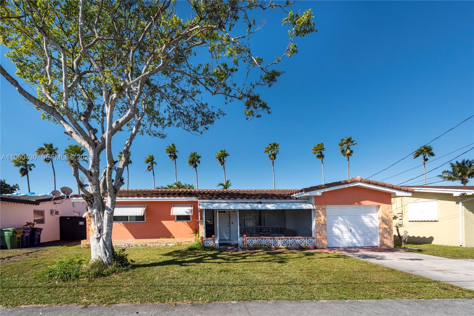 This unique property with no HOA is located in the desirable Hallandale Beach area featuring two separate units, each with its own entrance, offering potential for rental income or multi generational living. The first unit has 1 bedroom and 1 extra room (which can easily be converted to a bedroom) and an additional living area, spacious kitchen with stainless appliances & granite counters, family room, laundry room and a 1 car garage. The second unit has 1 bed, 1 bath small kitchenette and a living area. The home has a newer electric panel, large windows, trendy terrazzo floors, a large fully fenced yard and no back neighbors and exterior was recently painted. Just minutes to the beach, major highways, and Gulfstream, restaurants and shopping. Close to Aventura Mall. This home is the perfect blend of comfort, style and convenience. Great option for investors or families.