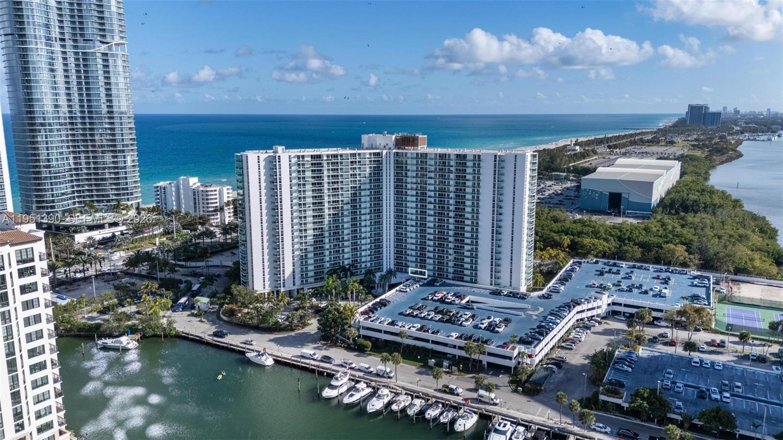 Investors you can RENT it IMMEDIATELY. Embrace a sophisticated coastal lifestyle at Arlen House in Sunny Isles Beach, ideally located on Collins Ave directly across from the beach. This 2-bedroom, 2-bath residence offers a bright, wide-open layout with north-facing views from every room and an oversized primary suite with two walk-in closets. Convenient laundry facilities are located on the same floor. Arlen House is a private, guard-gated community featuring resort-style amenities including a 24-hour secured lobby, fitness center, tennis courts, pool, jacuzzi, billiards room, valet, on-site café/restaurant, assigned covered parking, and private marina access. Prime location near the Ritz-Carlton and minutes to dining and shopping. Padel and Pickleball nearby.