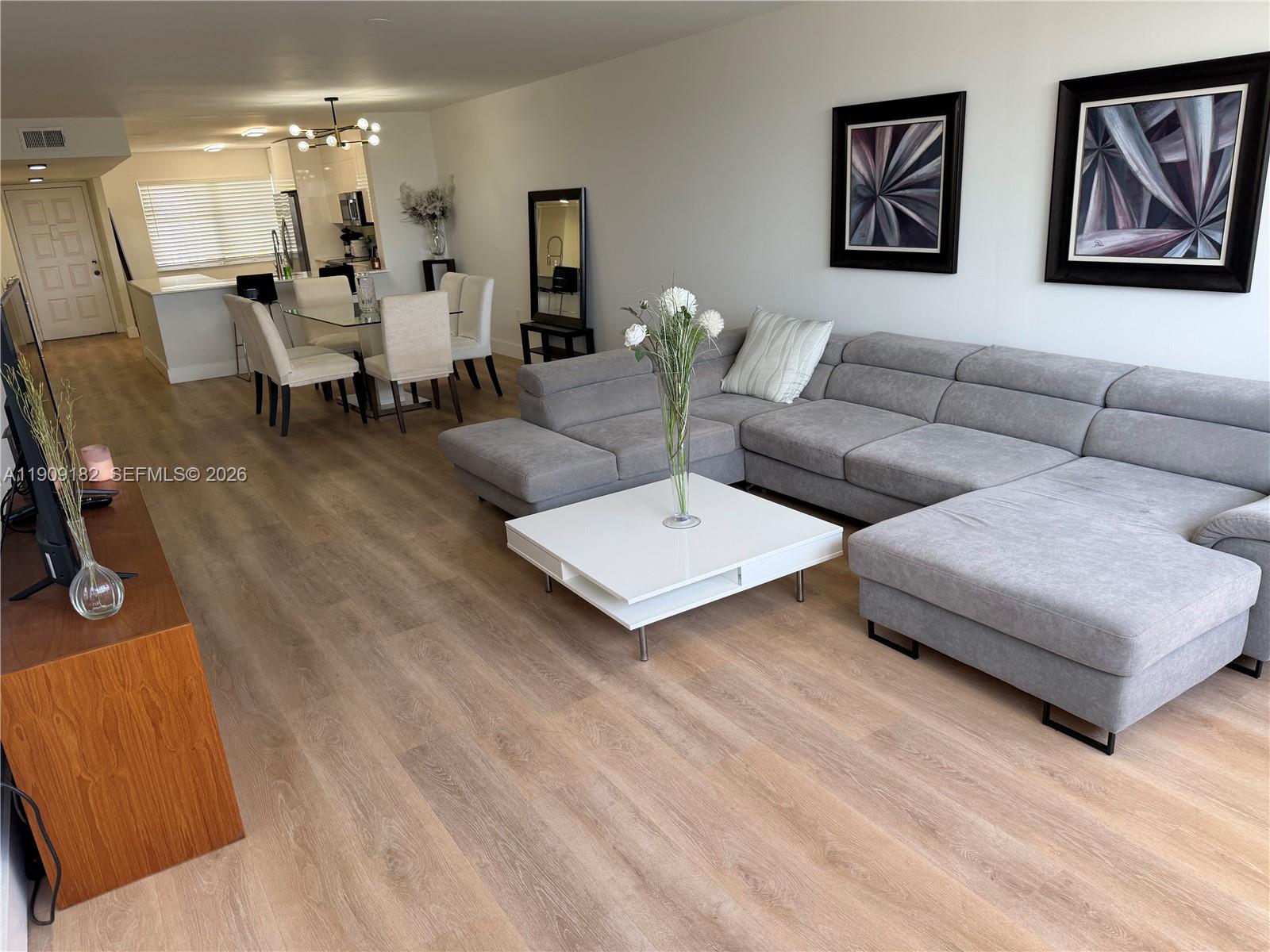 BEST DEAL in complex. Total update over $65k in upgrades. New Floors & Baths, AC, Kitchen cabinets and counters, paint etc. Very large TOP FLOOR 2/2  unit almost 1,400 sq ft. GOLF and LAKE views. Resort style living at budget price with great clubhouse pools, gyms, theatre, entertainment, FREE GOLF. One resident must be 55+ years old. Gated safe community that is very well maintained with no special assessments and condo passed all 40 year certifications. Condo has FULL RESERVES.  1 mile to Sawgrass mills mall and Plantation malls. 15 minutes to Downtown Fort Laud and beaches. Will Sell furnished or unfurnished. Brokers covered. EASY to SHOW