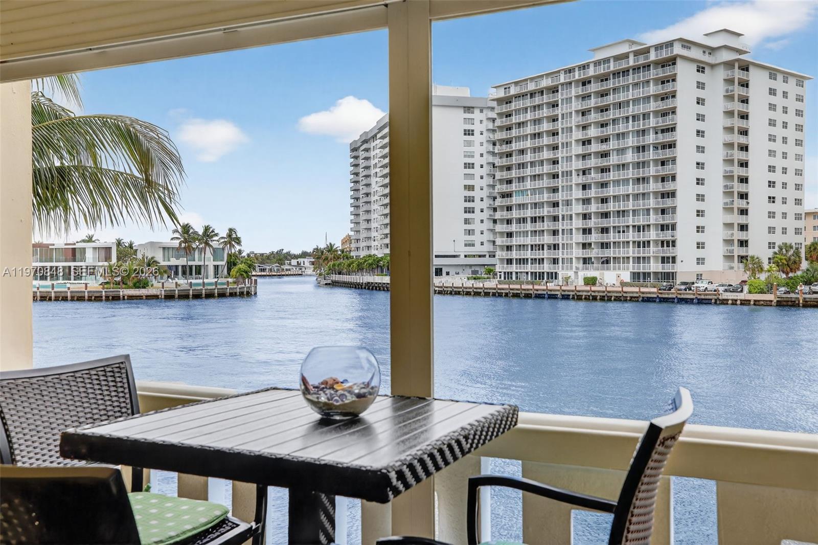 Wonderful and truly unique opportunity to own a waterfront residence directly on the Intracoastal Waterway in sought-after Hallandale Beach—just steps from the beach! Enjoy breathtaking, unobstructed water views with passing boats and spectacular sunsets right from your home. Location, location, location! This immaculate 2-bedroom, 2-bathroom residence is located in a boutique 4-story, all-ages building and features impact windows and sliding glass doors, new porcelain flooring throughout, and oversized baseboards for a modern, elegant finish. From the moment you walk in, you’re greeted by stunning water views that make an unforgettable impression. Offered fully furnished and turnkey—just bring your suitcase! The A/C is only 4 years old. Low maintenance fees add to the appeal. Relax at the community pool overlooking the Intracoastal, or take a short stroll to the beach and nearby South City Beach Park. Enjoy evenings at Gulfstream Park, or explore premier dining, shopping, and entertainment just minutes away. Possibility to rent after 5 years of ownership. Experience the ultimate South Florida waterfront lifestyle!