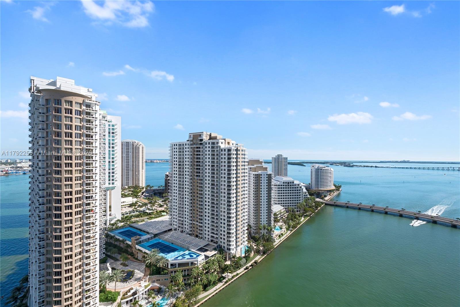 Experience the ultimate in Miami luxury living at Icon Brickell. This Philippe Starck–designed 3BR/2BA corner residence showcases breathtaking panoramic views of Biscayne Bay and the glittering Brickell skyline from every room. Enjoy beautiful sunrises and sunsets through floor-to-ceiling glass across 1,870 SF of refined interiors plus a 210 SF terrace. Features include a chef’s kitchen with Sub-Zero & Wolf appliances, two parking spaces (option for four), and a serene primary suite with a spa-inspired bath, dual vanities, soaking tub, and walk-in closet—your private retreat in the sky.